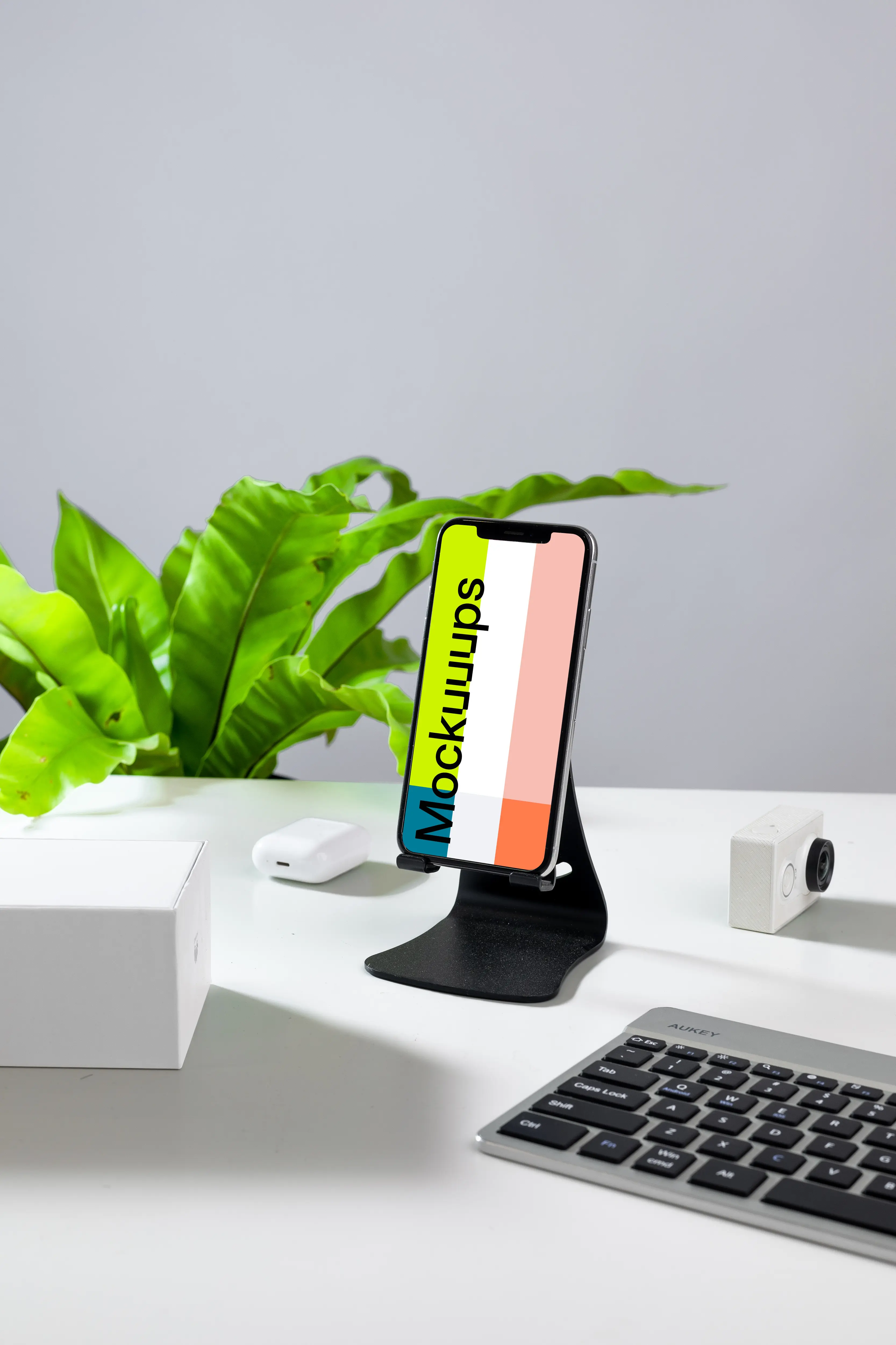iPhone mockup on a phone stand