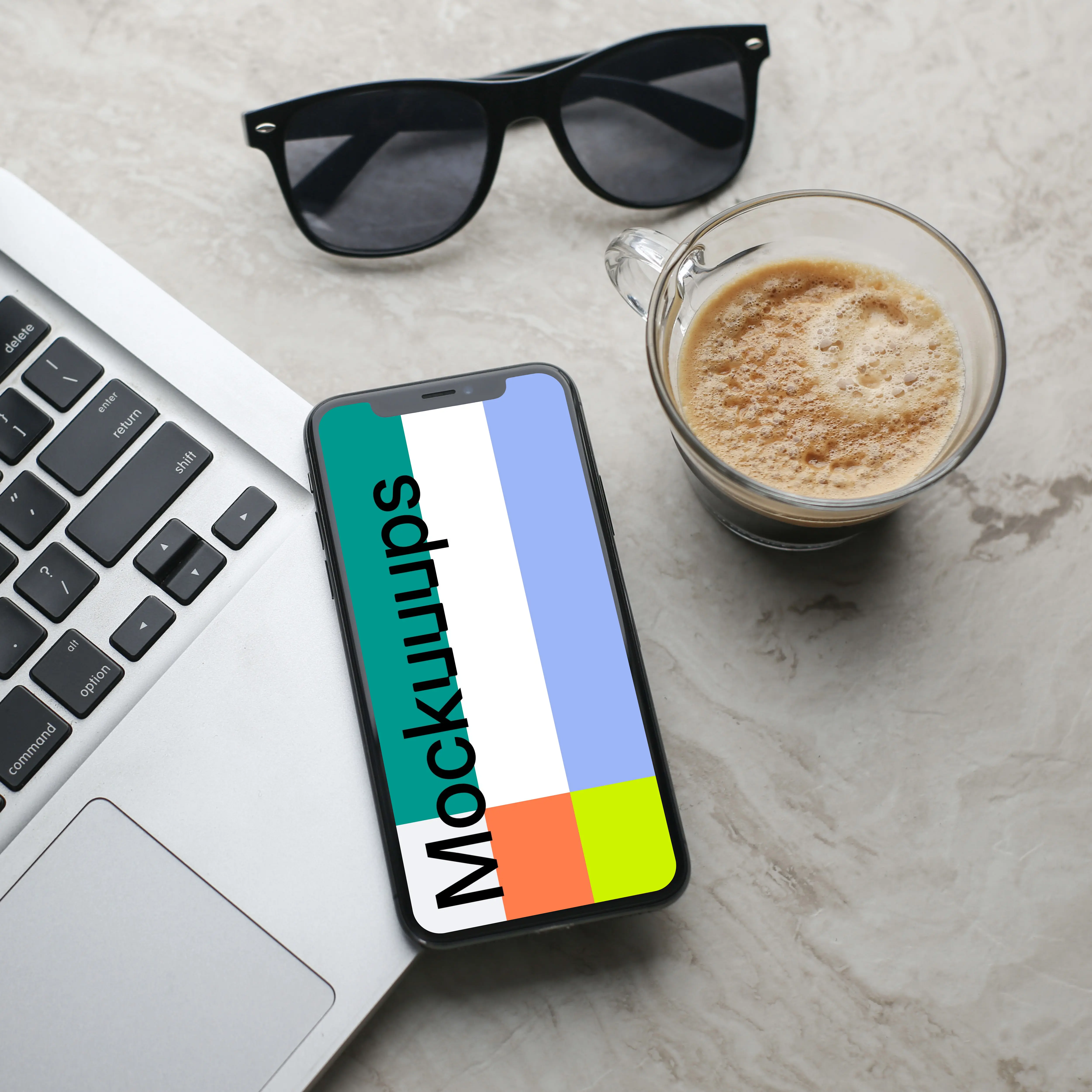 iPhone mockup placed on a MacBook