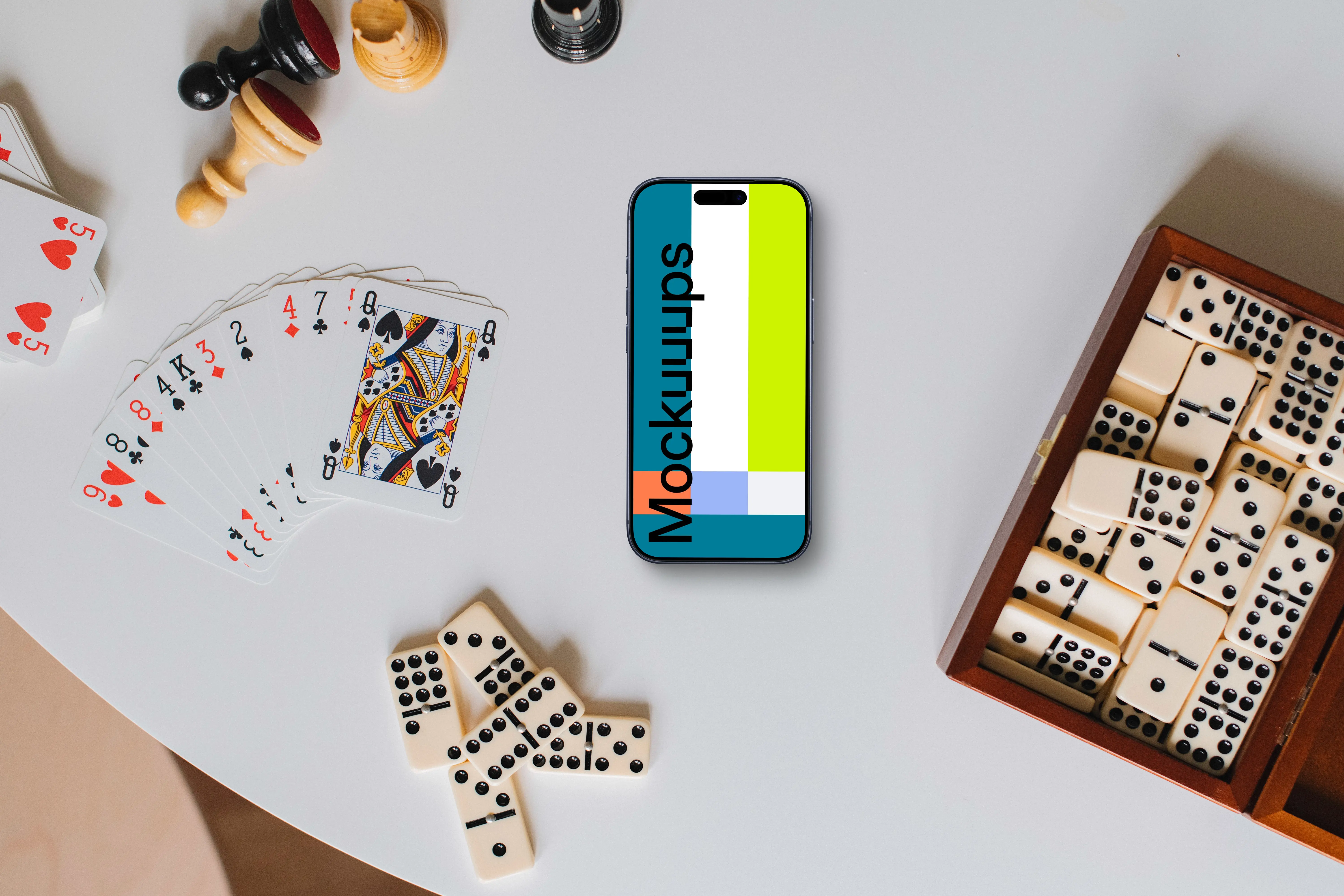 iPhone mockup surrounded by board games