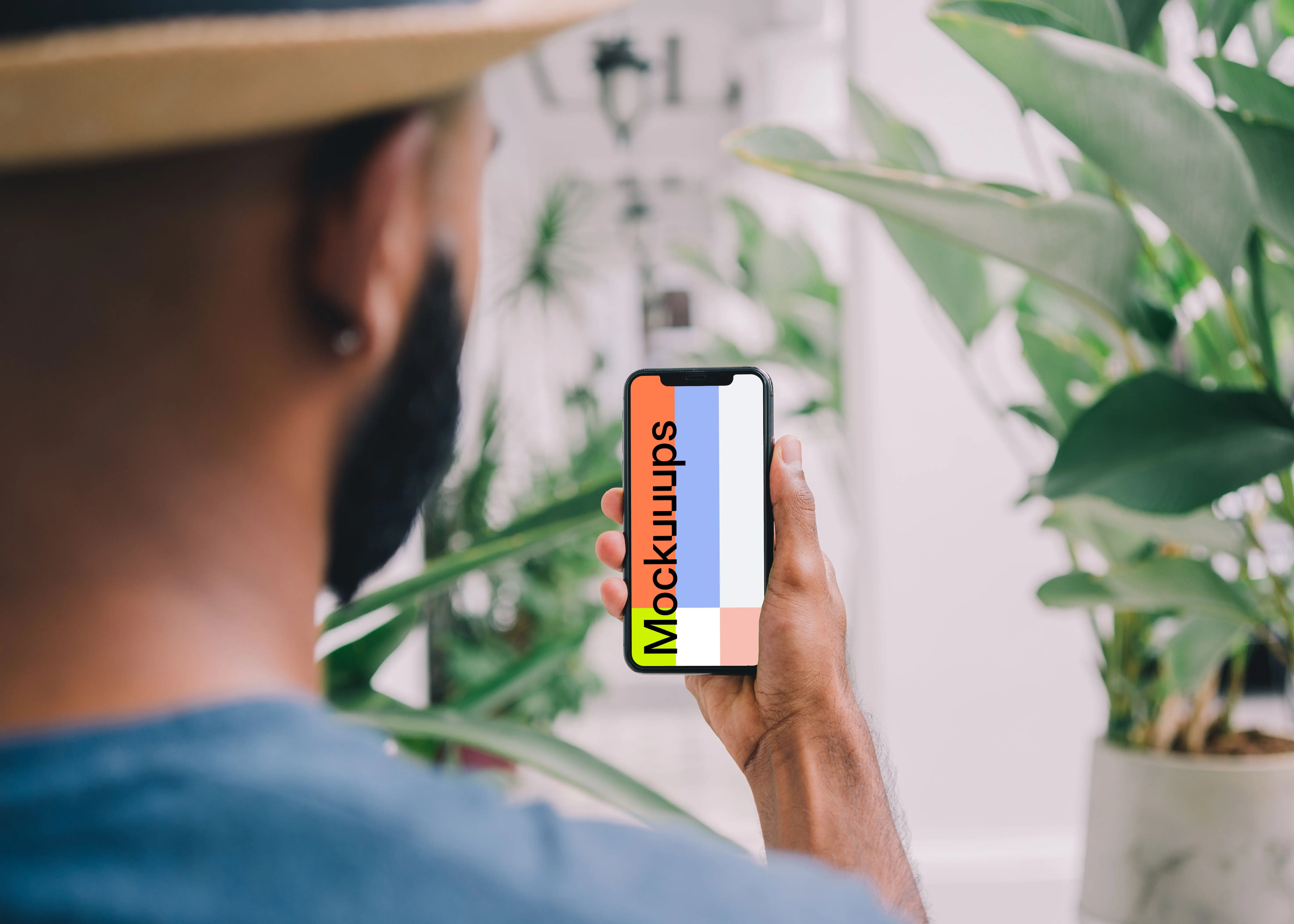 iPhone mockup with flowers in the background