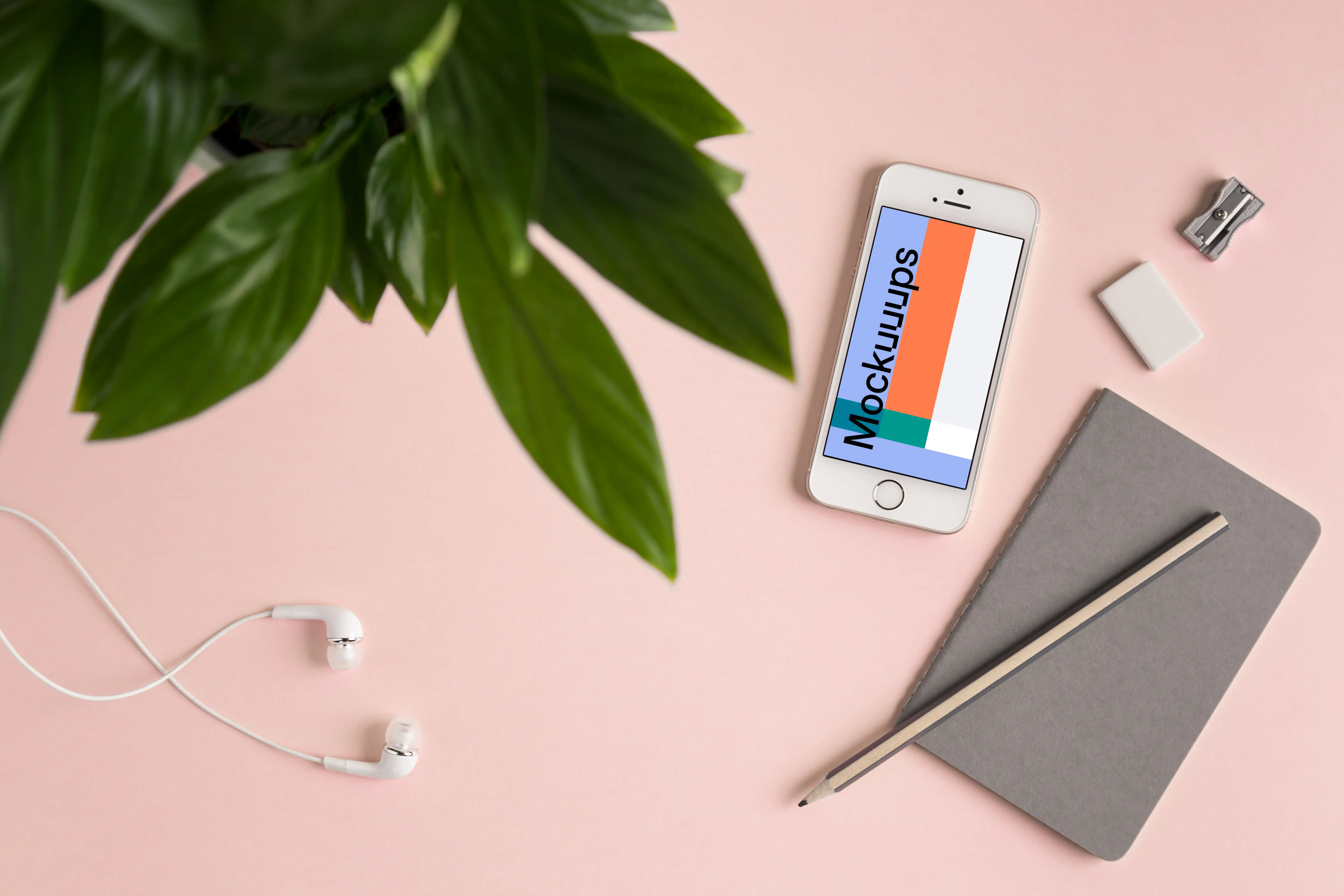 iPhone SE mockup on pink background