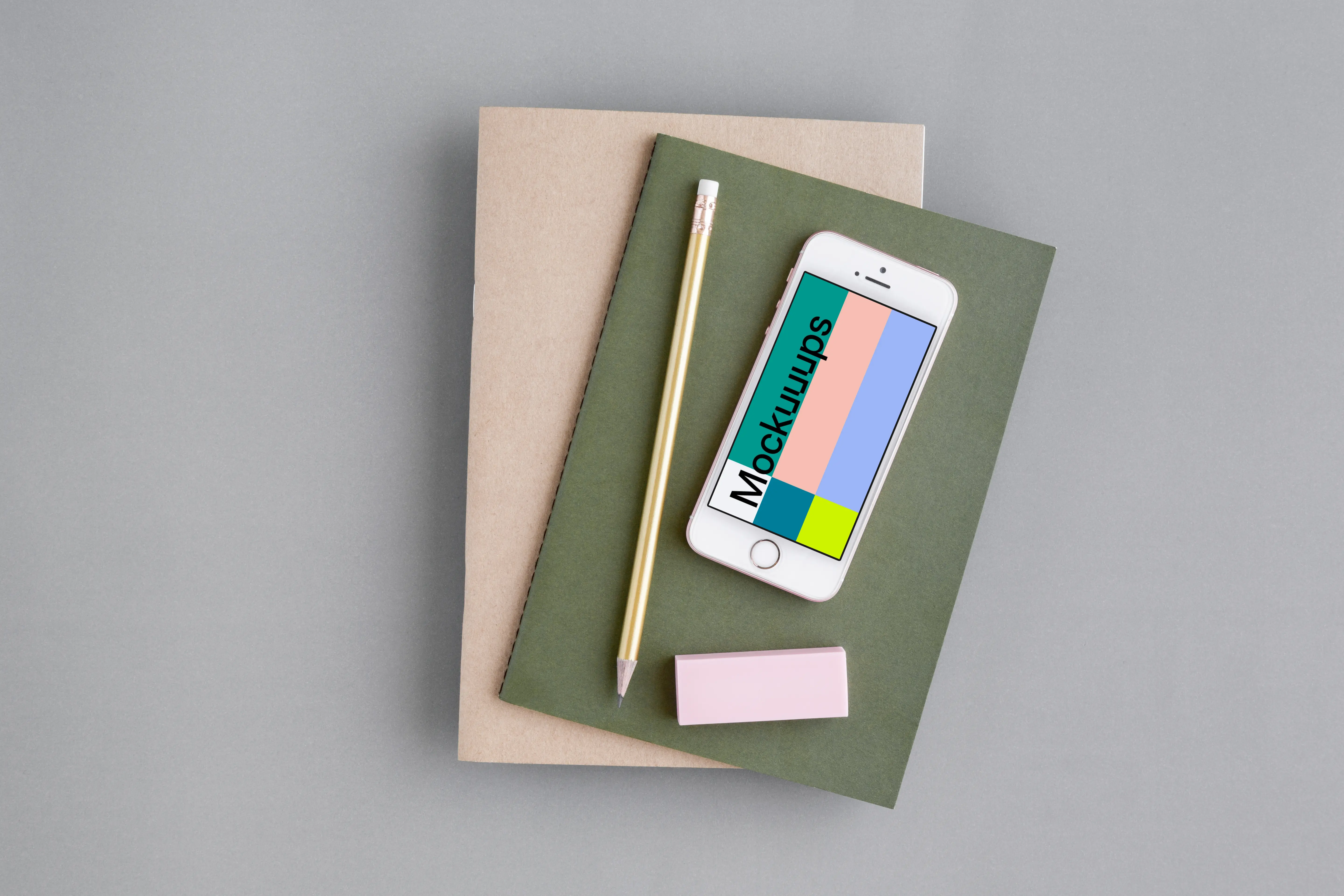 iPhone SE mockup with a green and brown journal