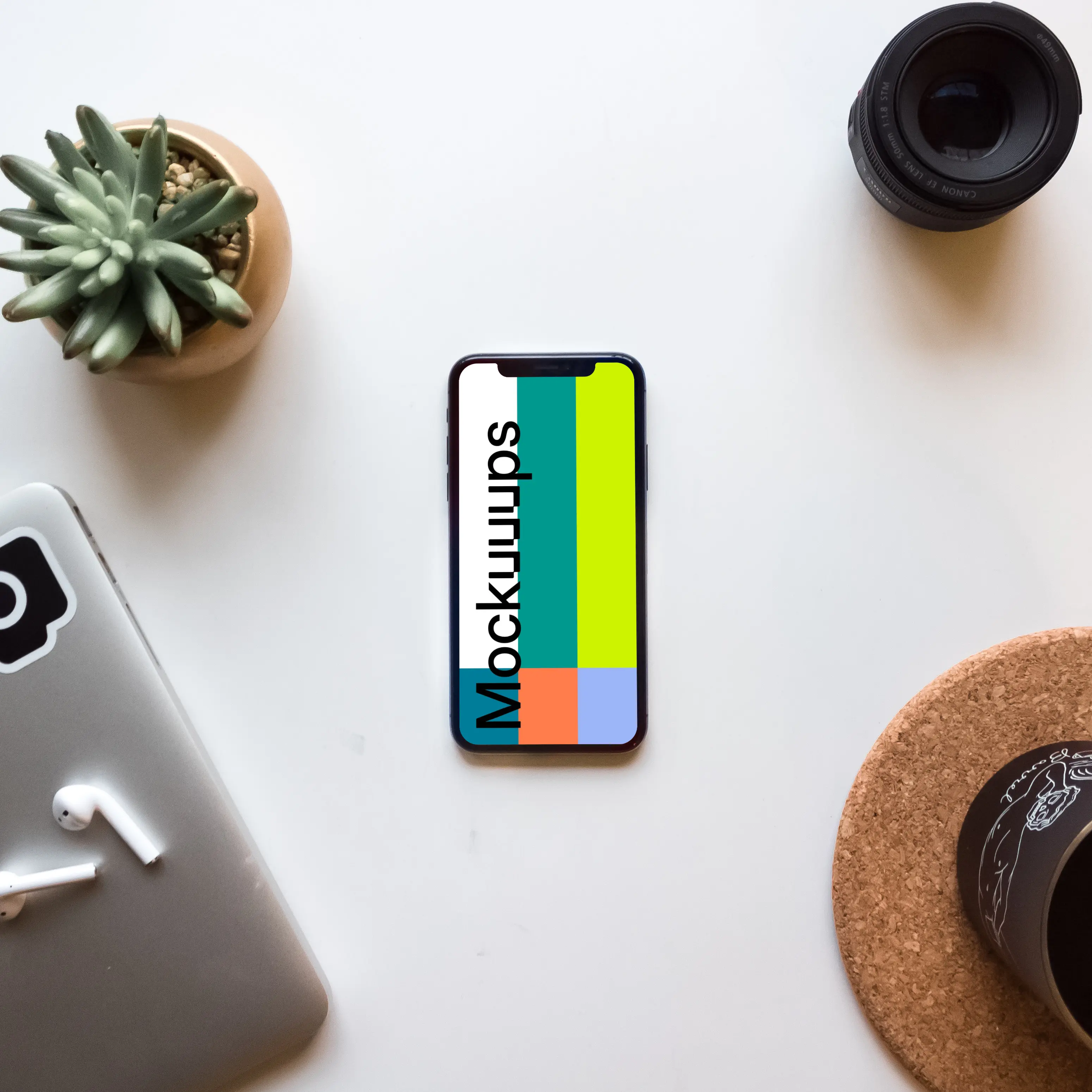 iPhone X Space Gray mockup on white table