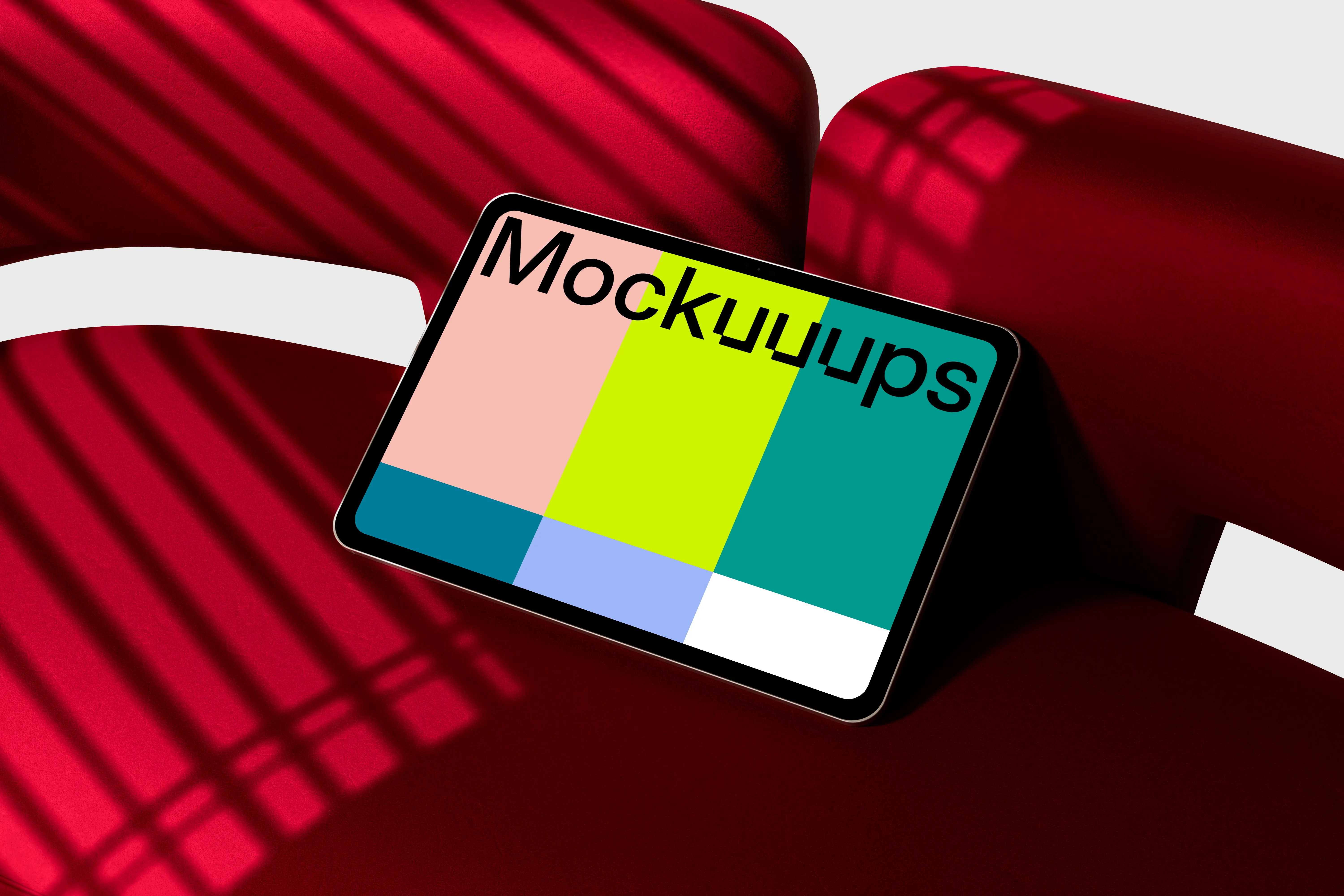 Landscape iPad Pro mockup on a red modern chair