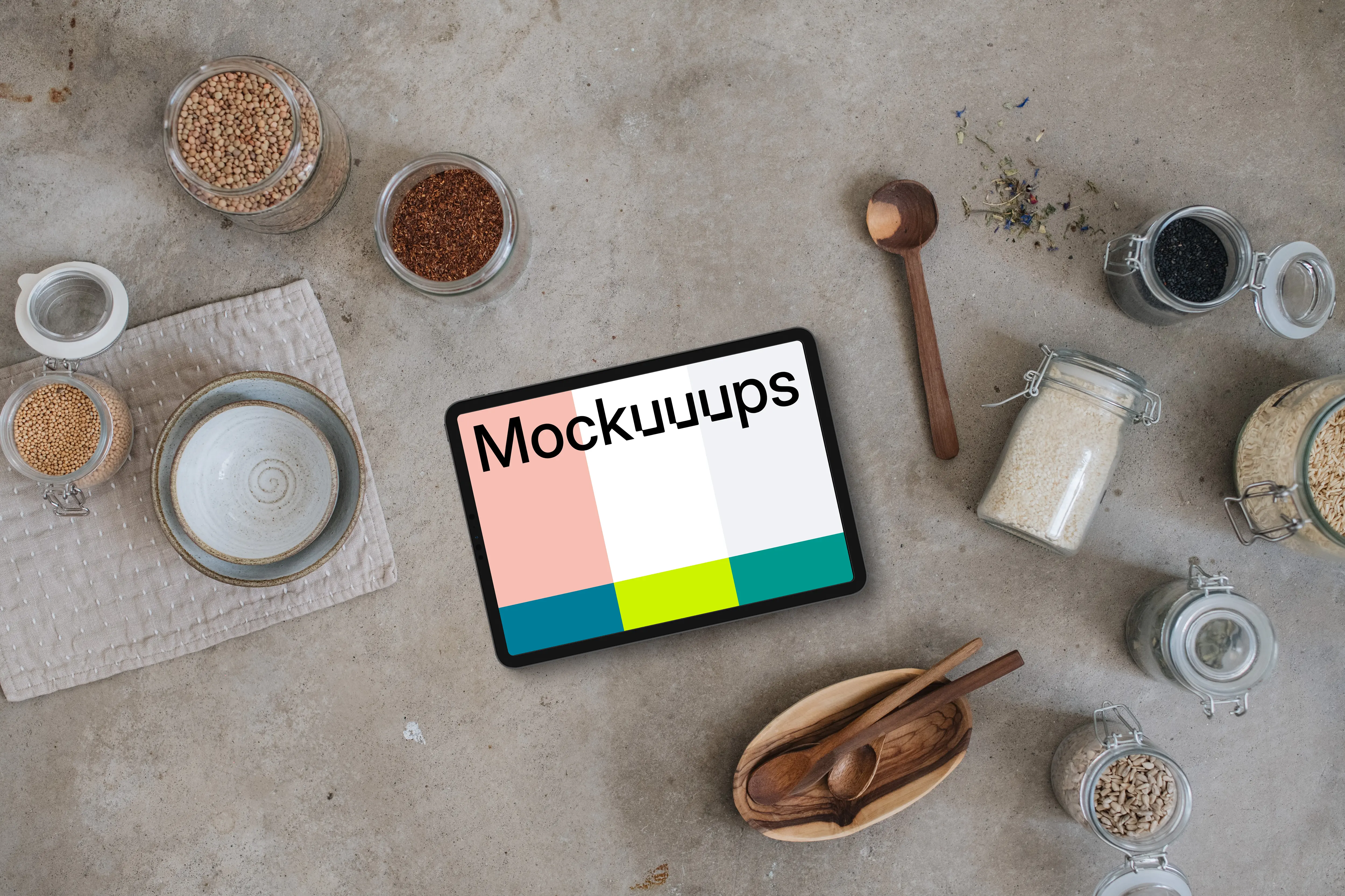 Landscape tablet mockup next to the jars