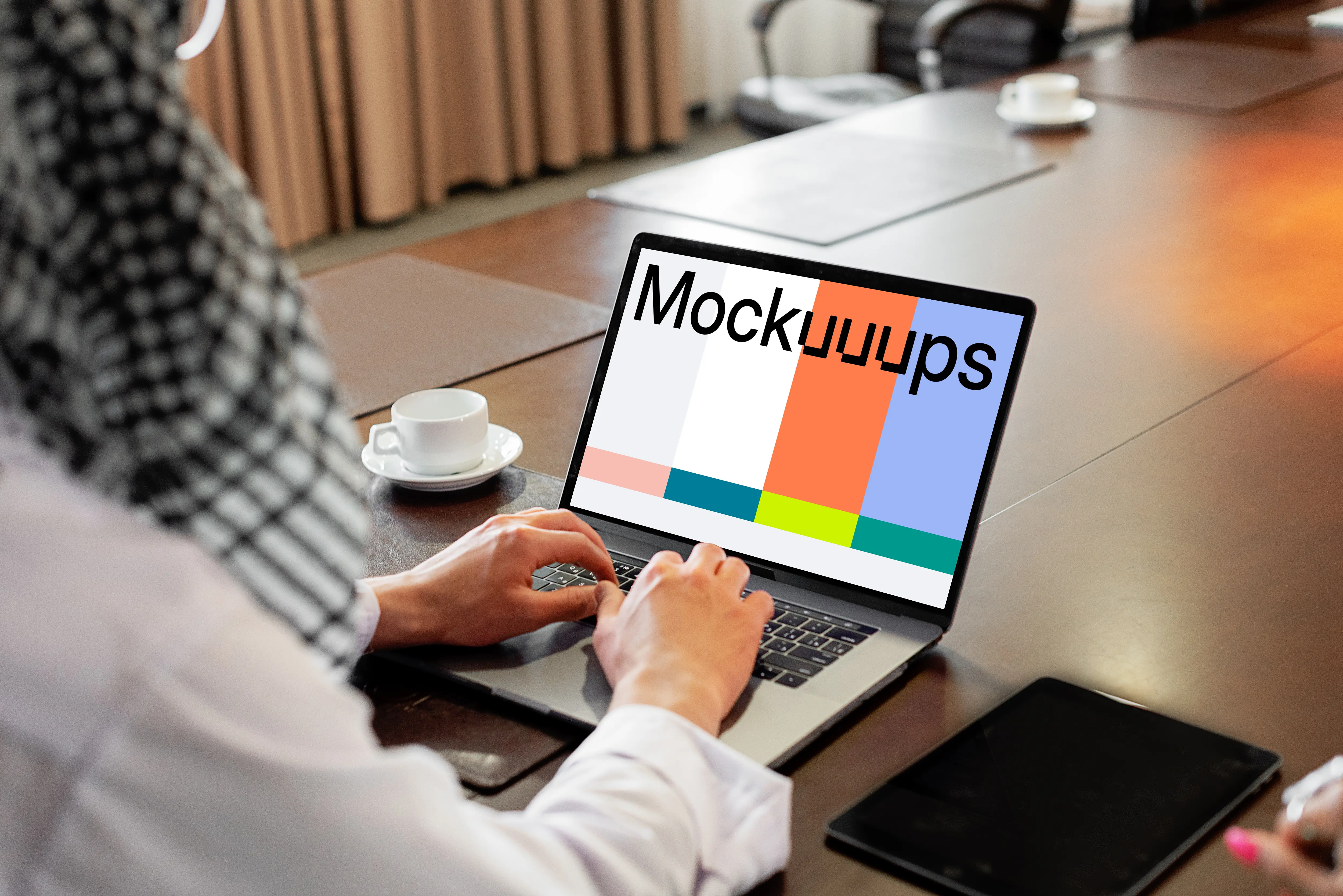 MacBook Air Mockup used by a lady on a conference table