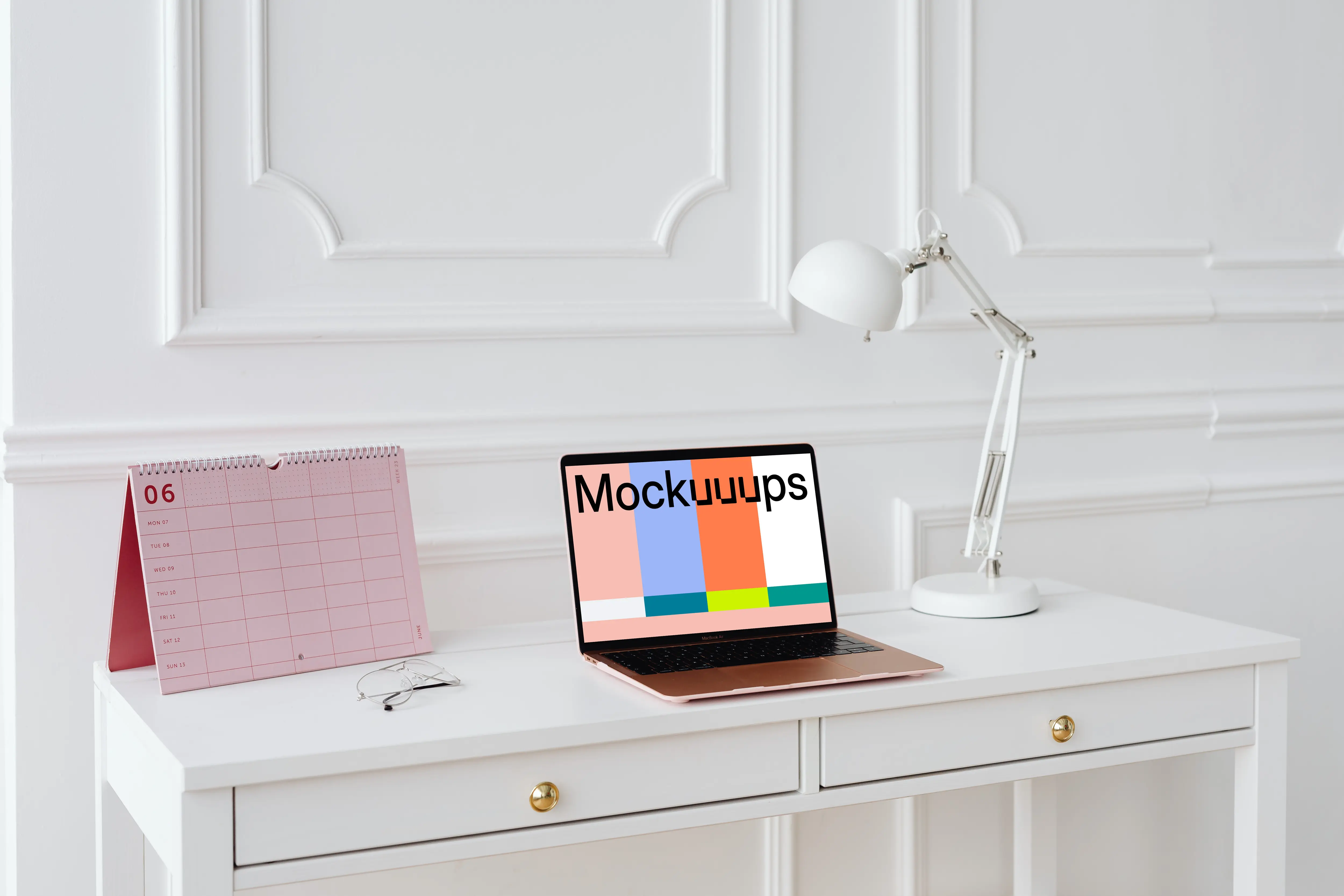 MacBook Air mockup with a pink calendar at the side