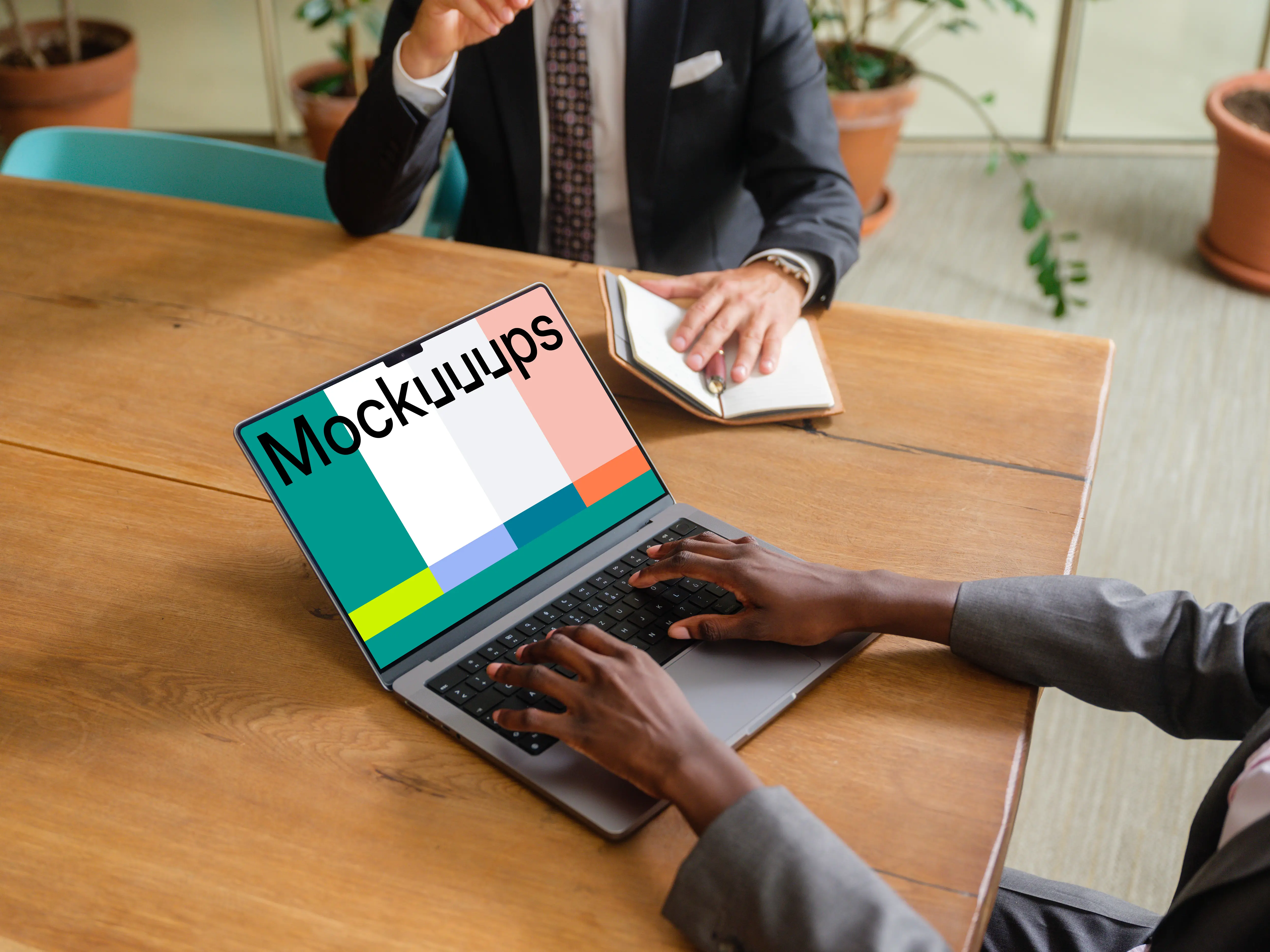 MacBook Pro 14 mockup in the business meeting