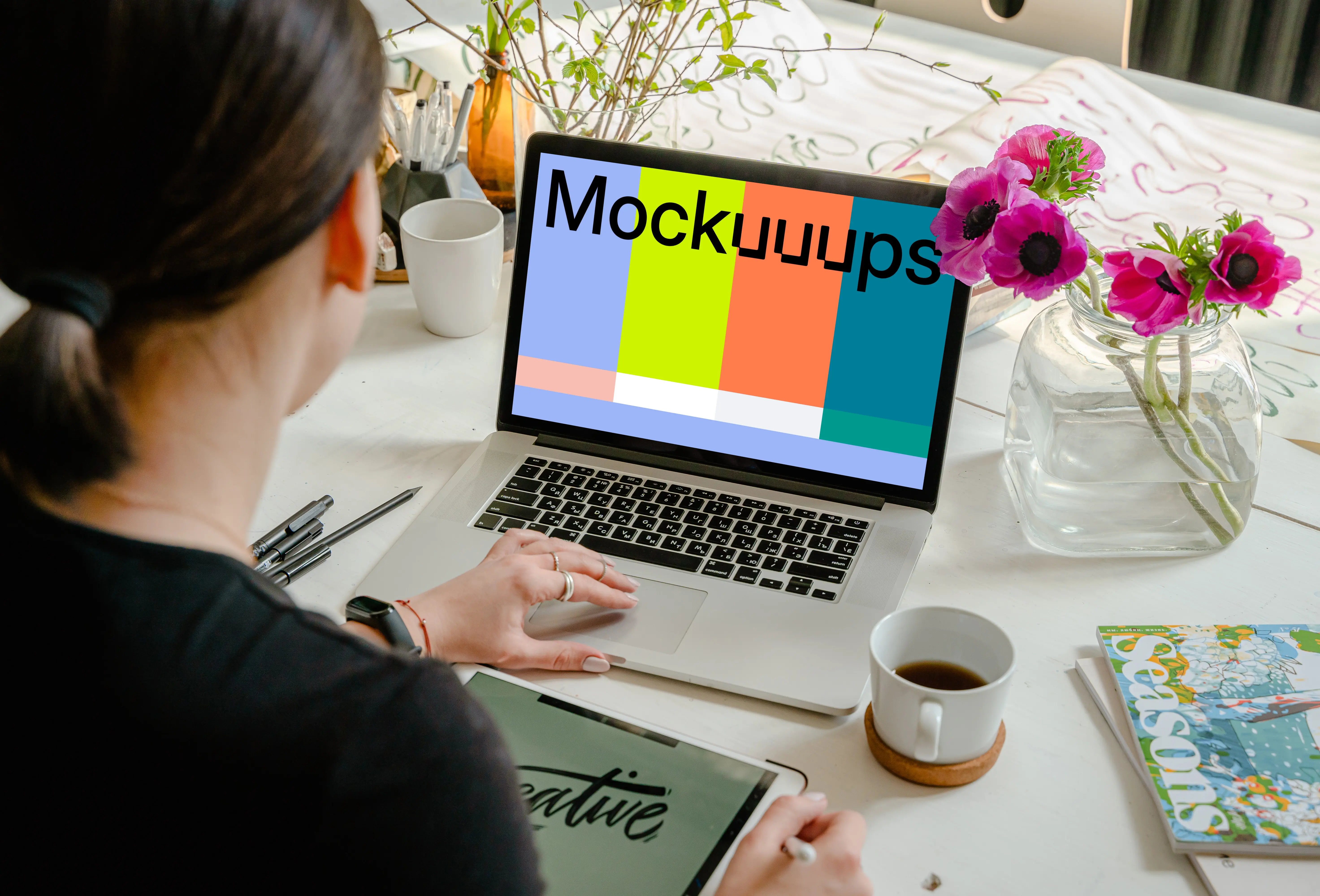 MacBook Pro mockup beside a cup of coffee and nice flowers