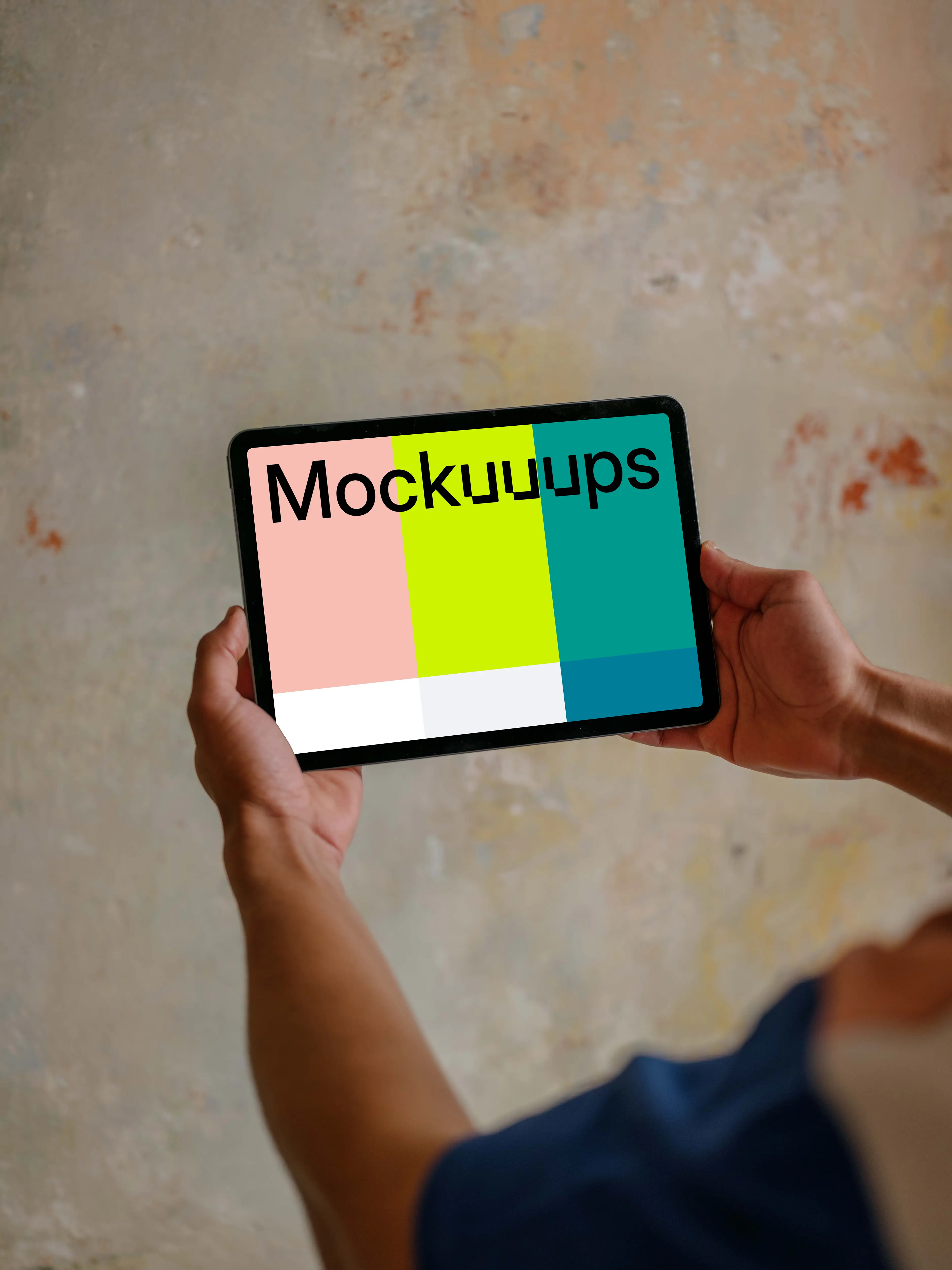 Male hands holding iPad mockup