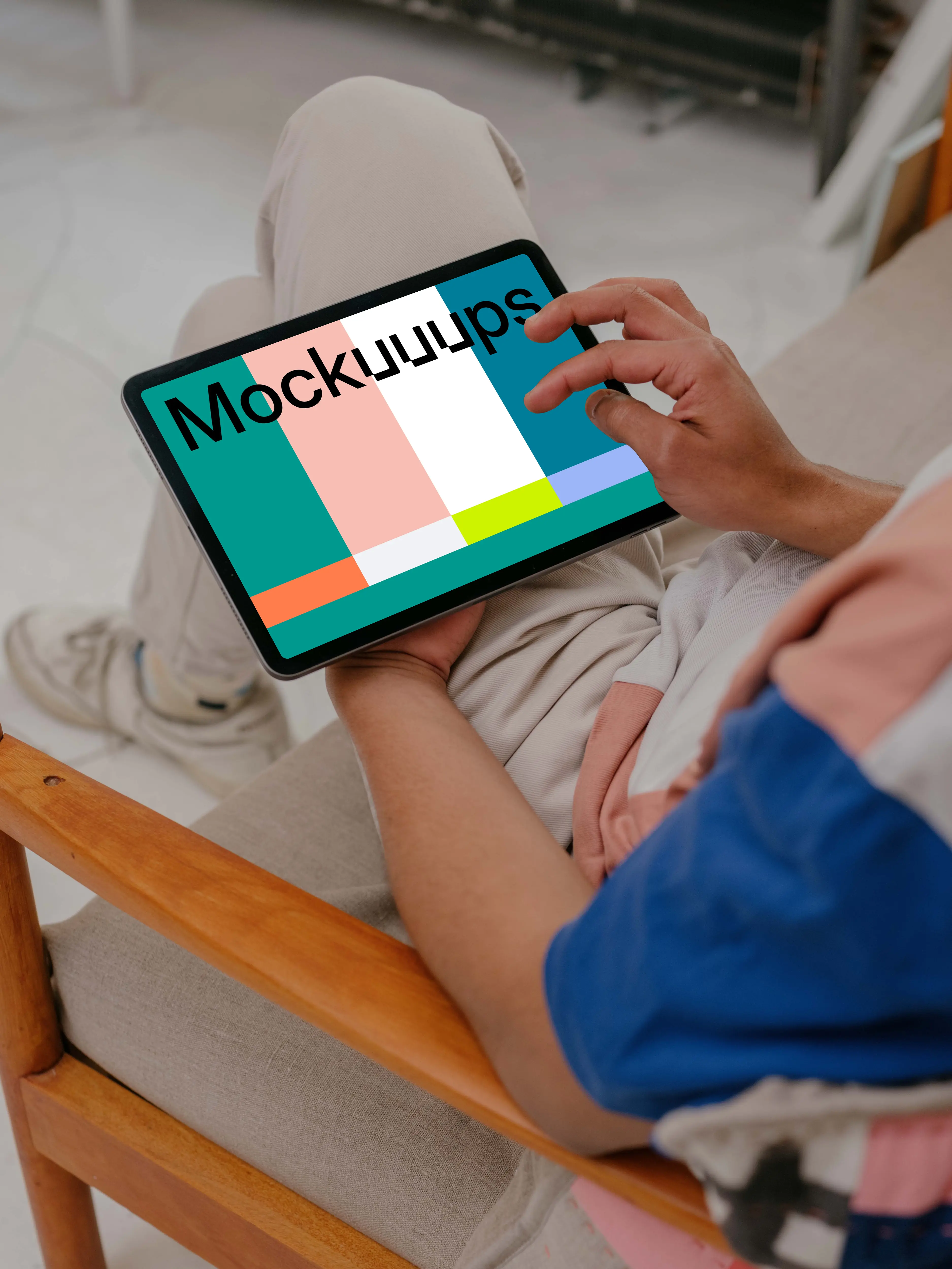 Male hands working on iPad Air mockup