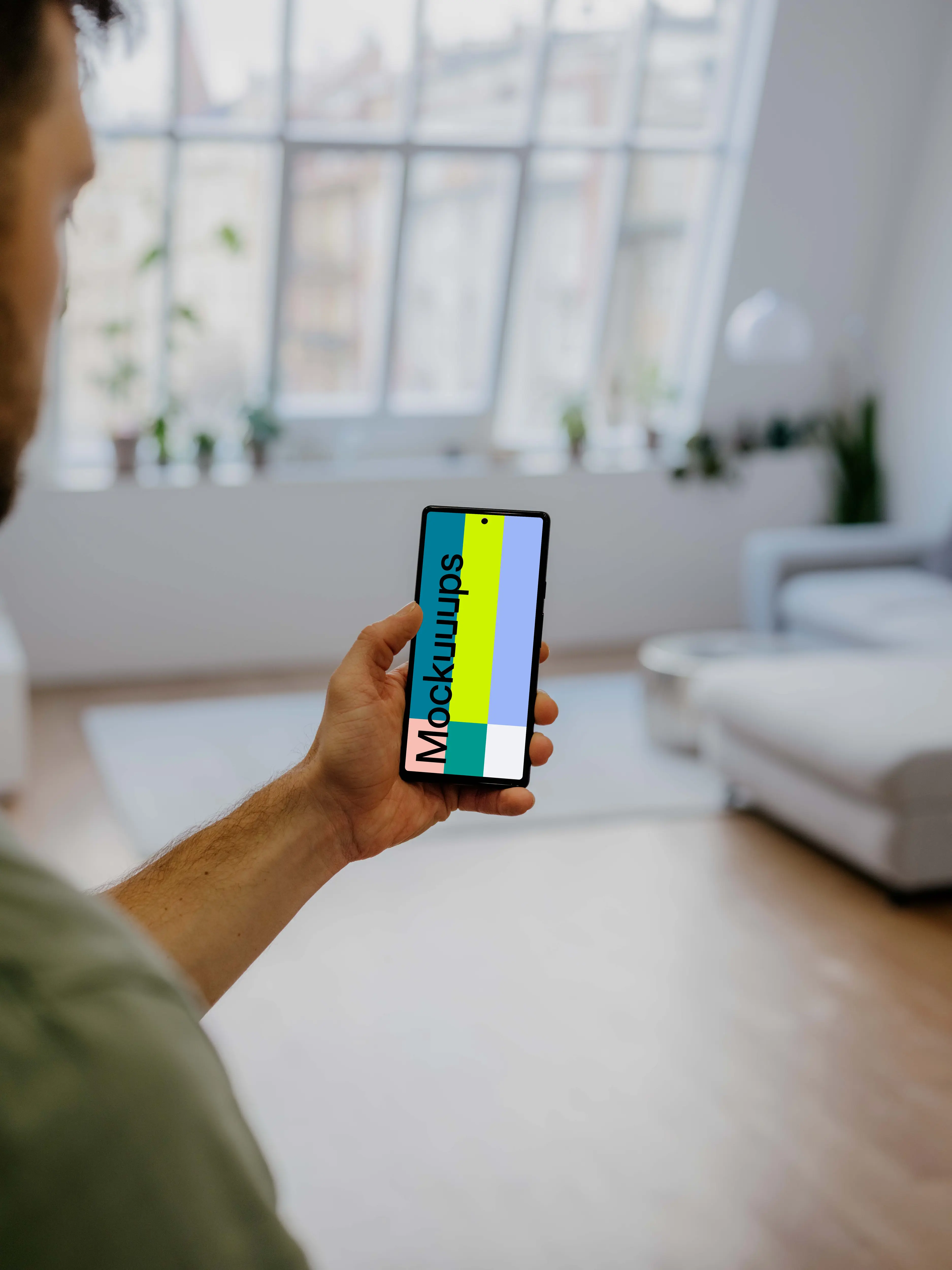 Man holding a Pixel 6 mockup