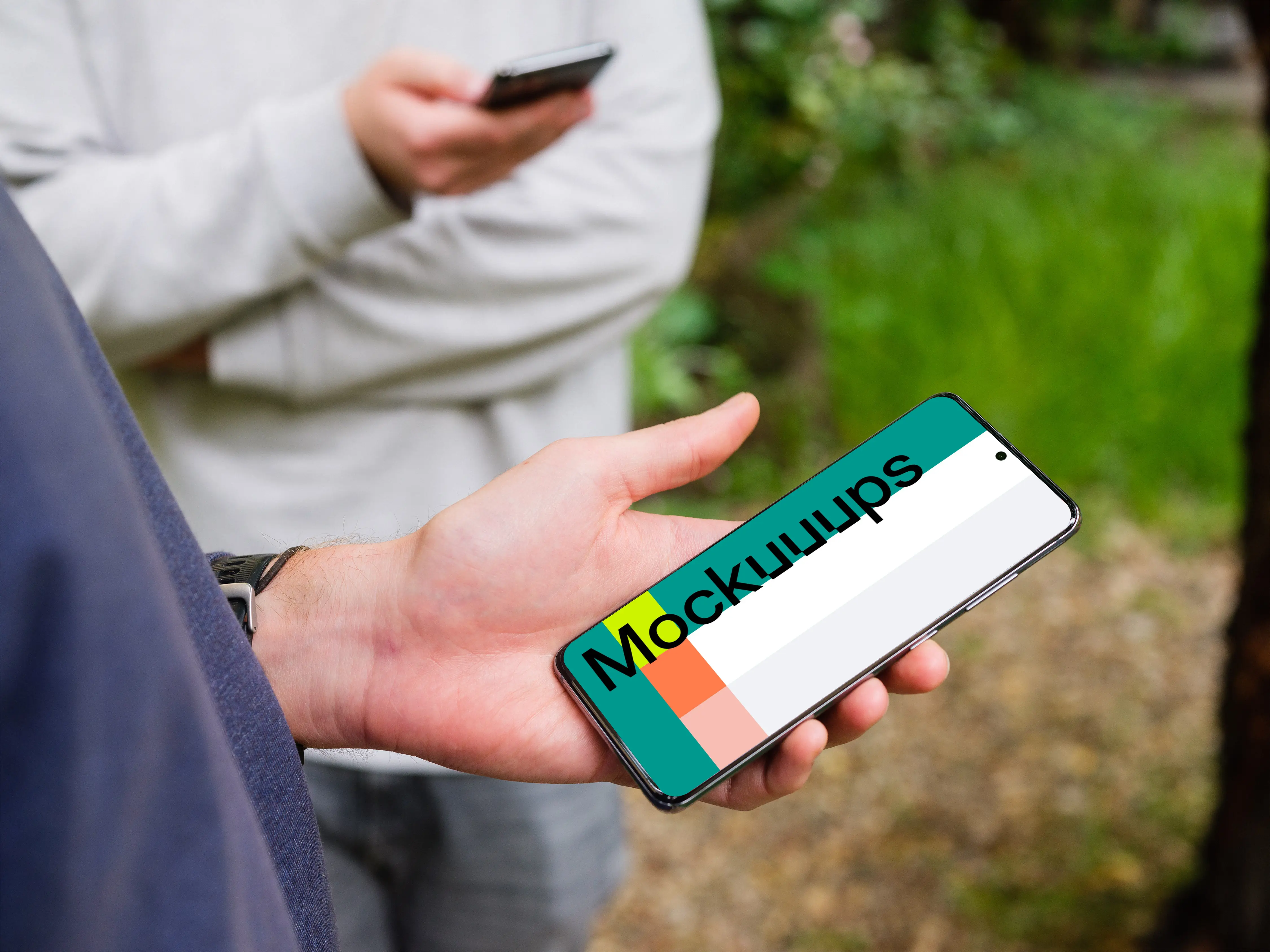 Man holding Samsung Galaxy S20 mockup with a friend