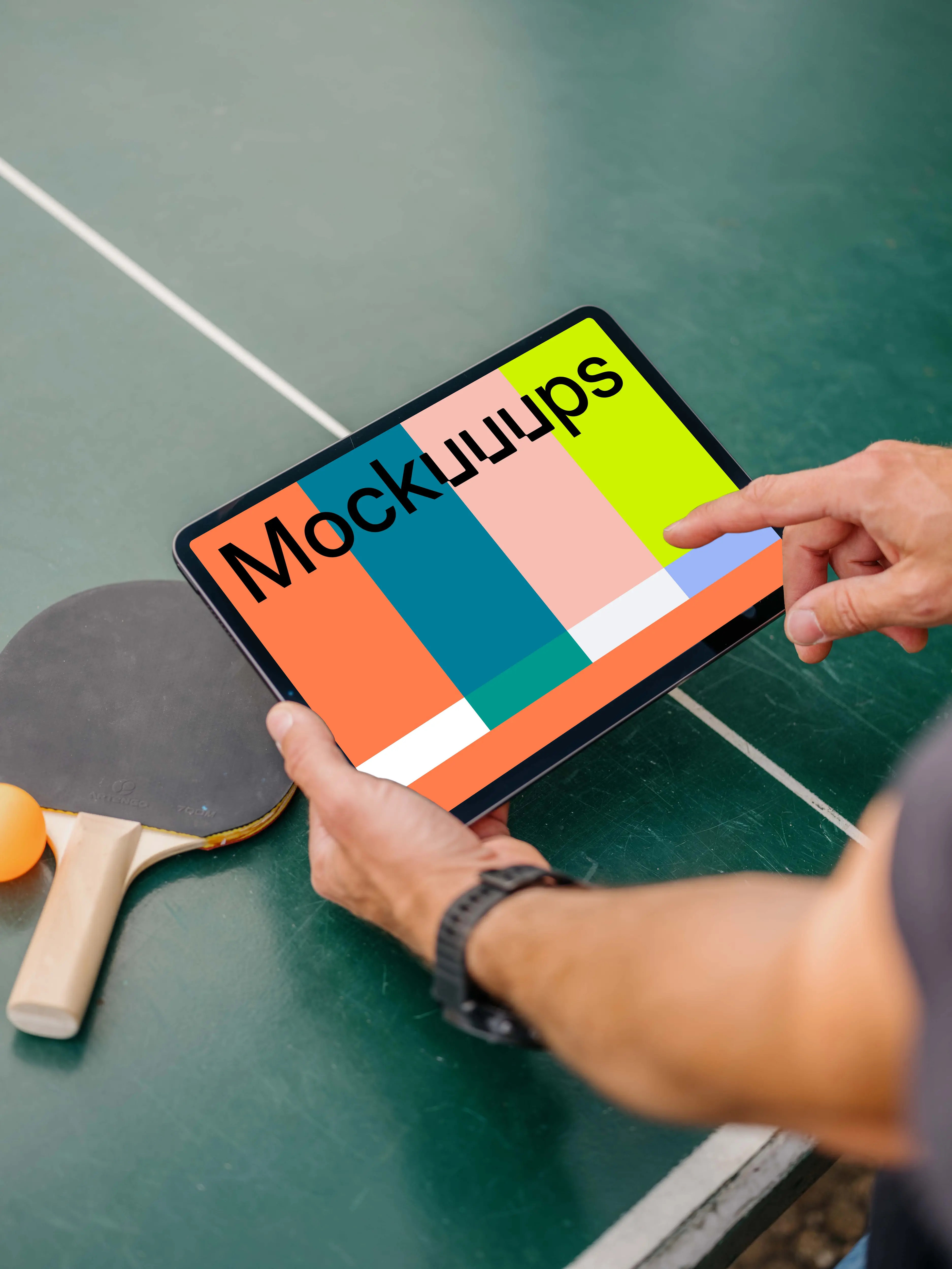 Man pointing on an iPad mockup