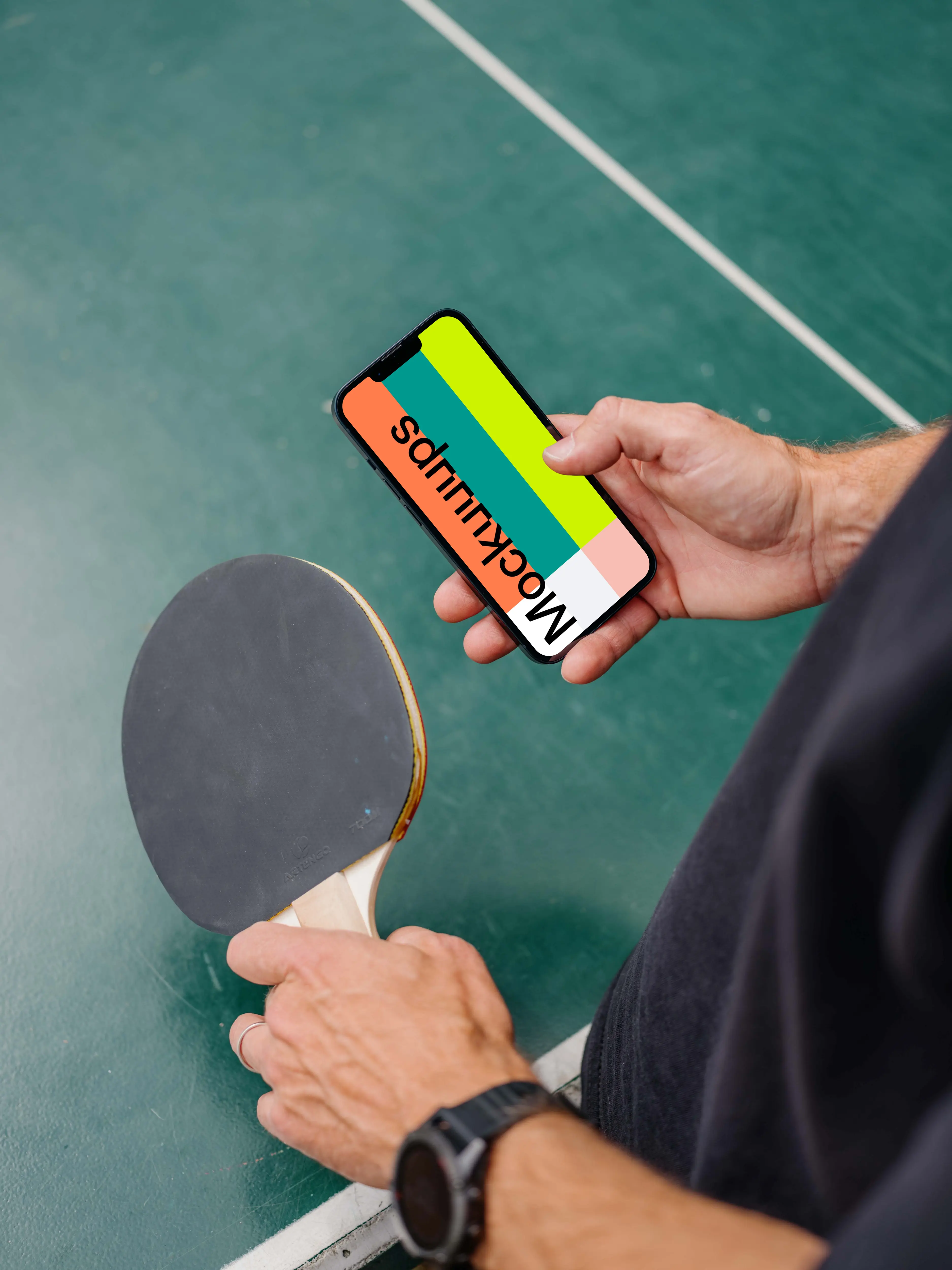 Man typing on an iPhone 13 mockup