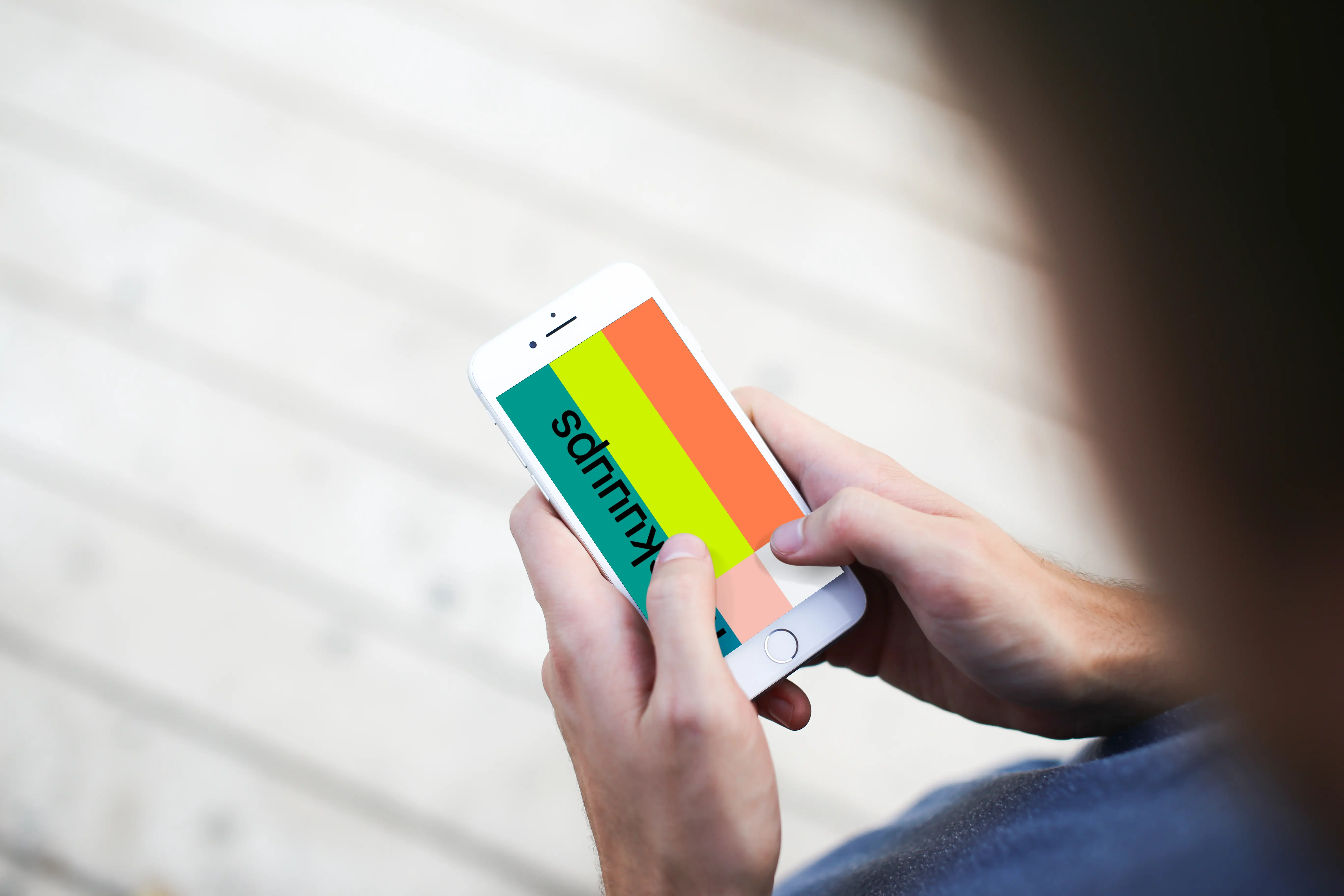 Man typing on iPhone 7 mockup