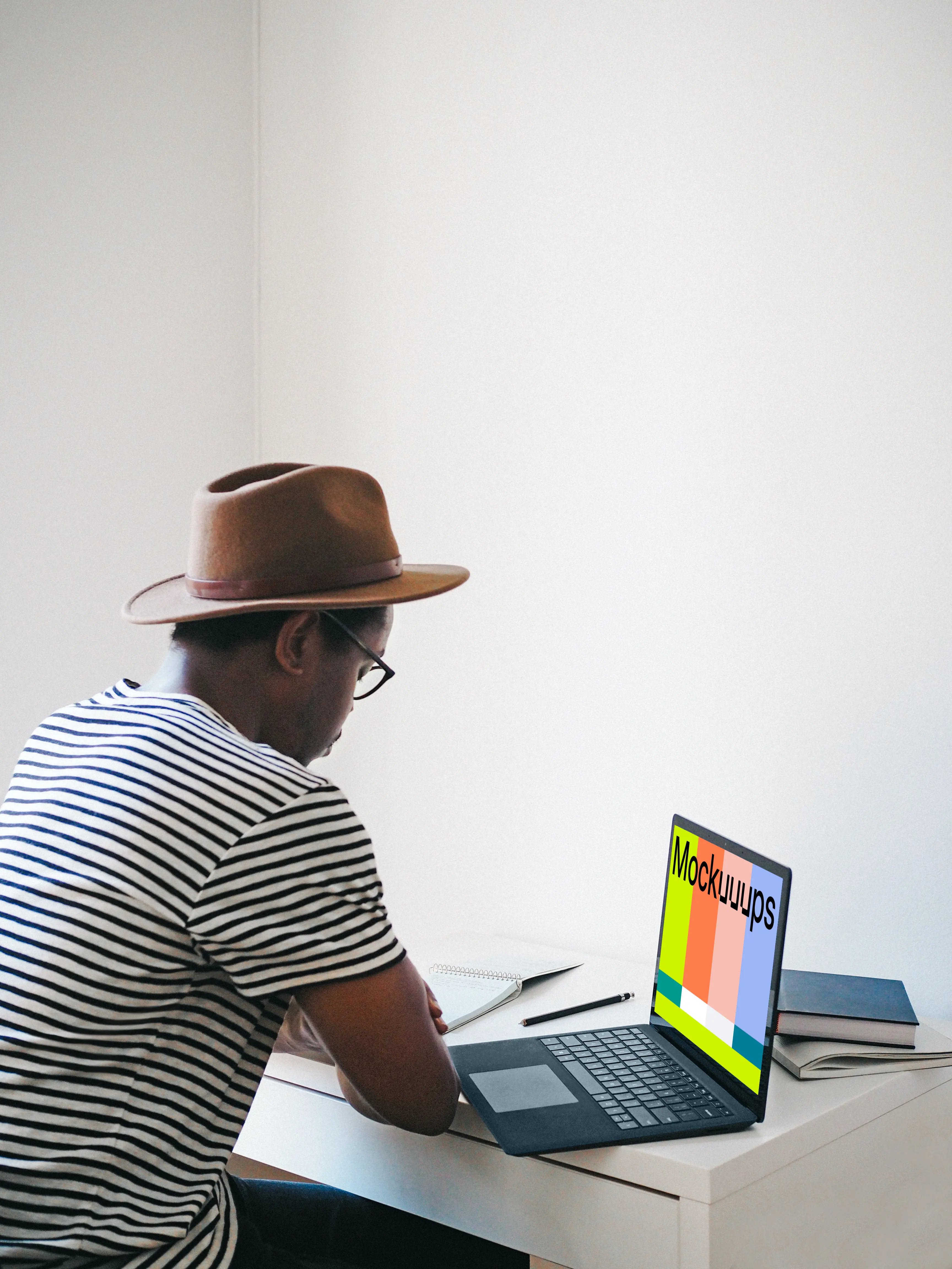 Man with Microsoft Surface Laptop mockup