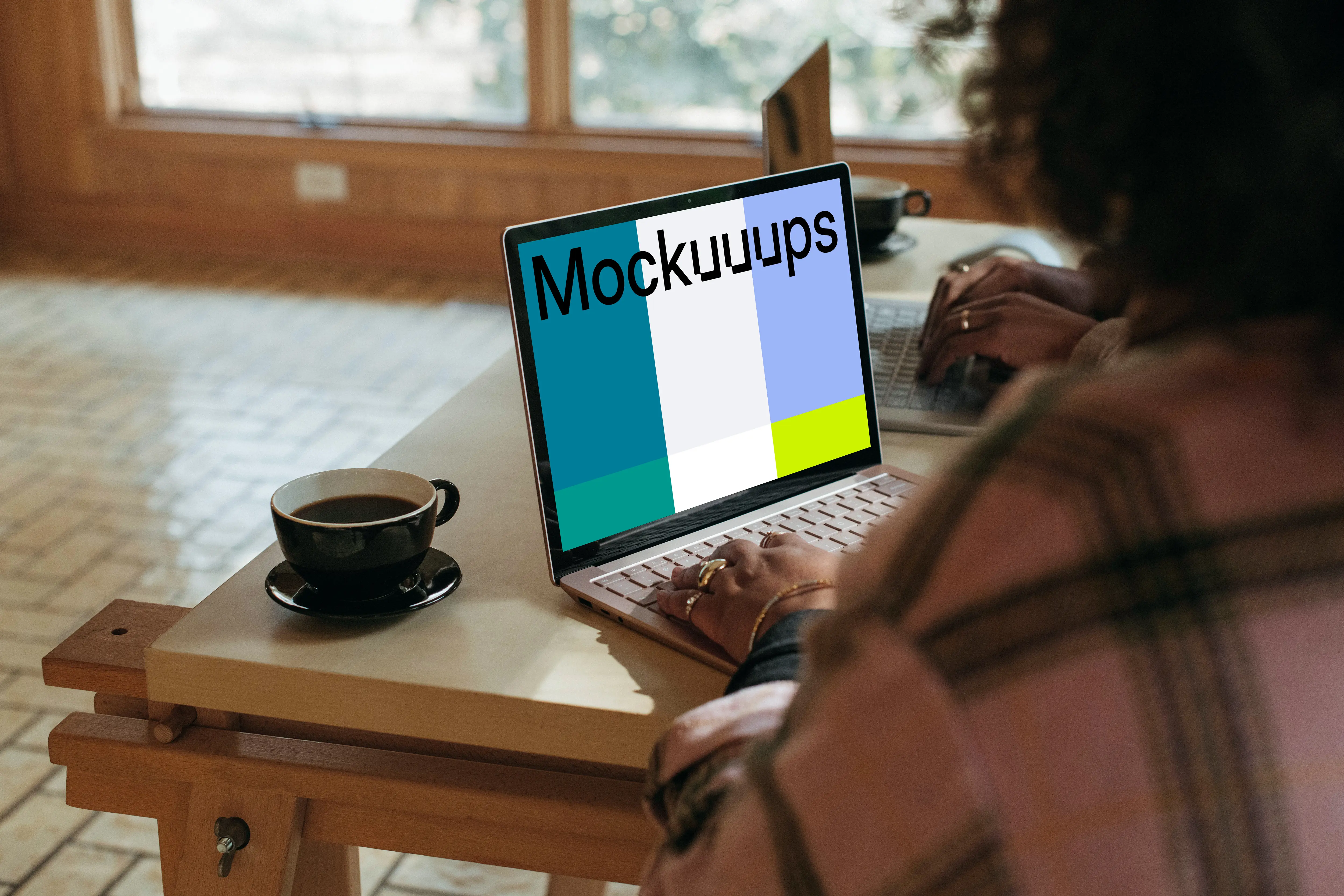 Microsoft Surface laptop mockup being used by a lady