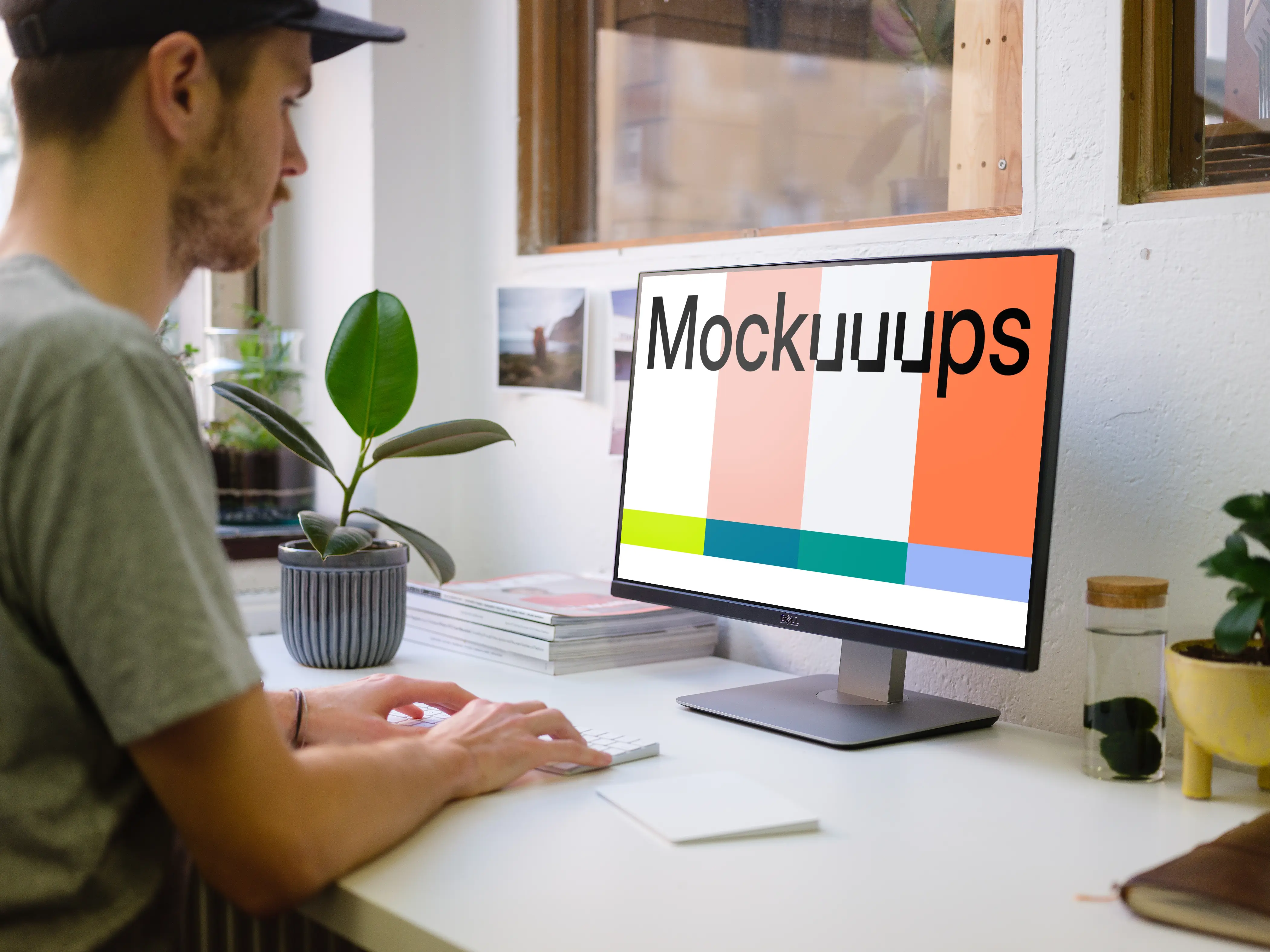 Mockup of young man working on the computer