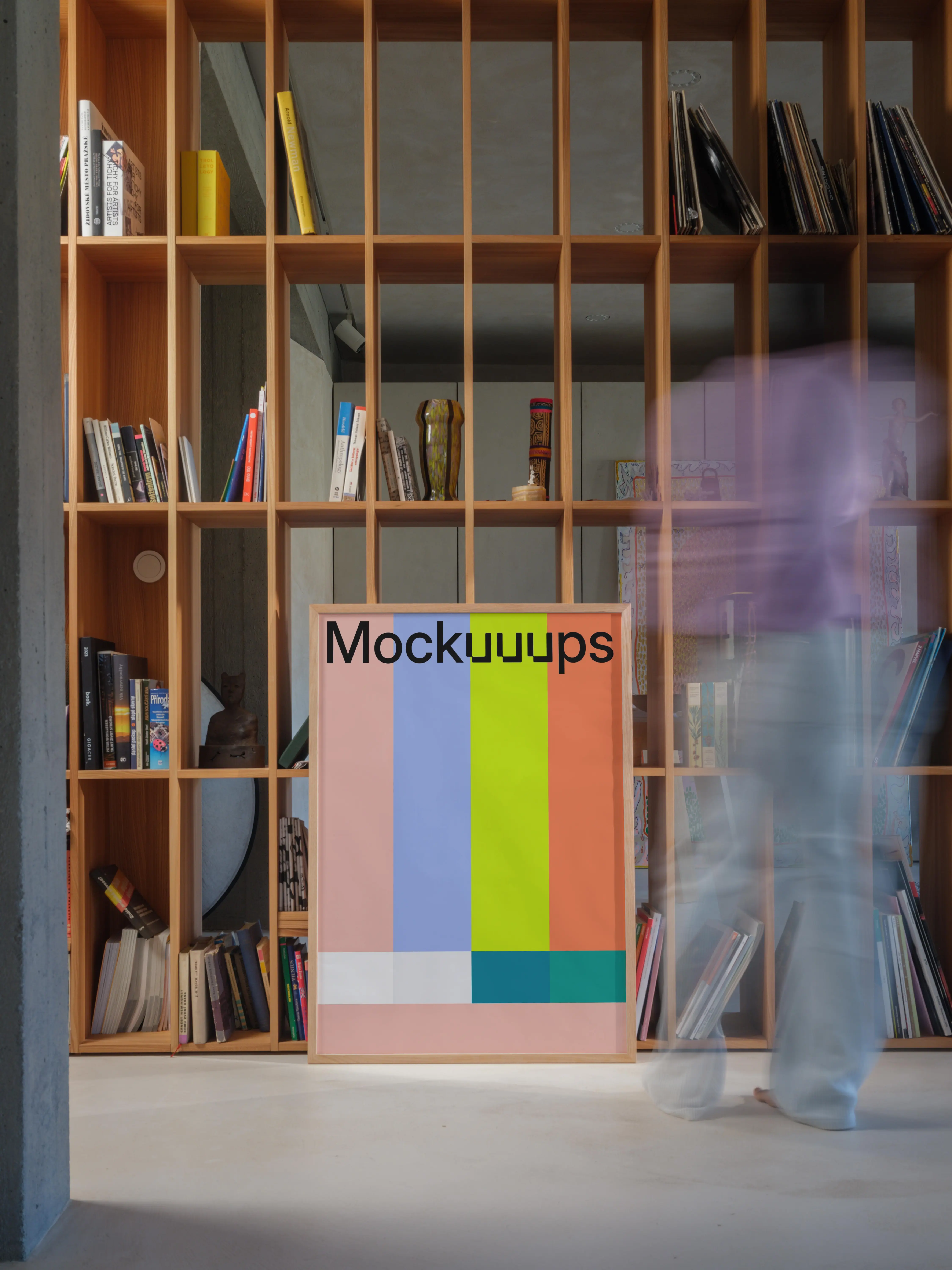 Poster mockup in front of a modern wooden bookshelf