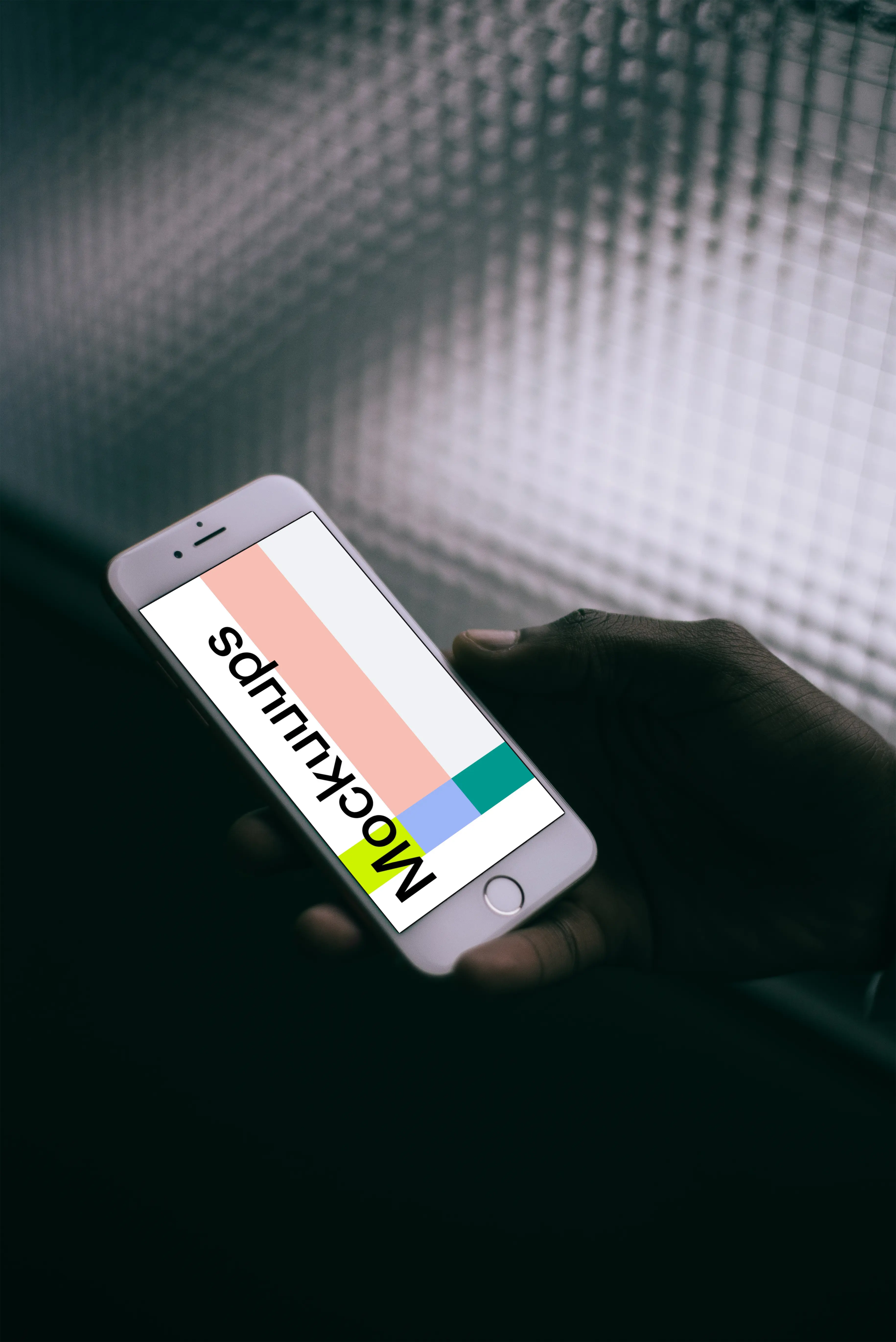 Silver iPhone 6s mockup in the dark