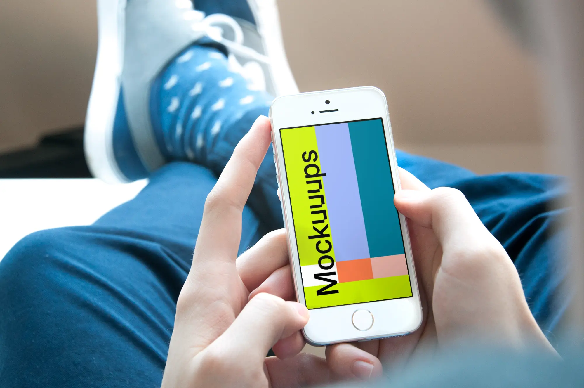 Sitting and playing games on iPhone SE mockup