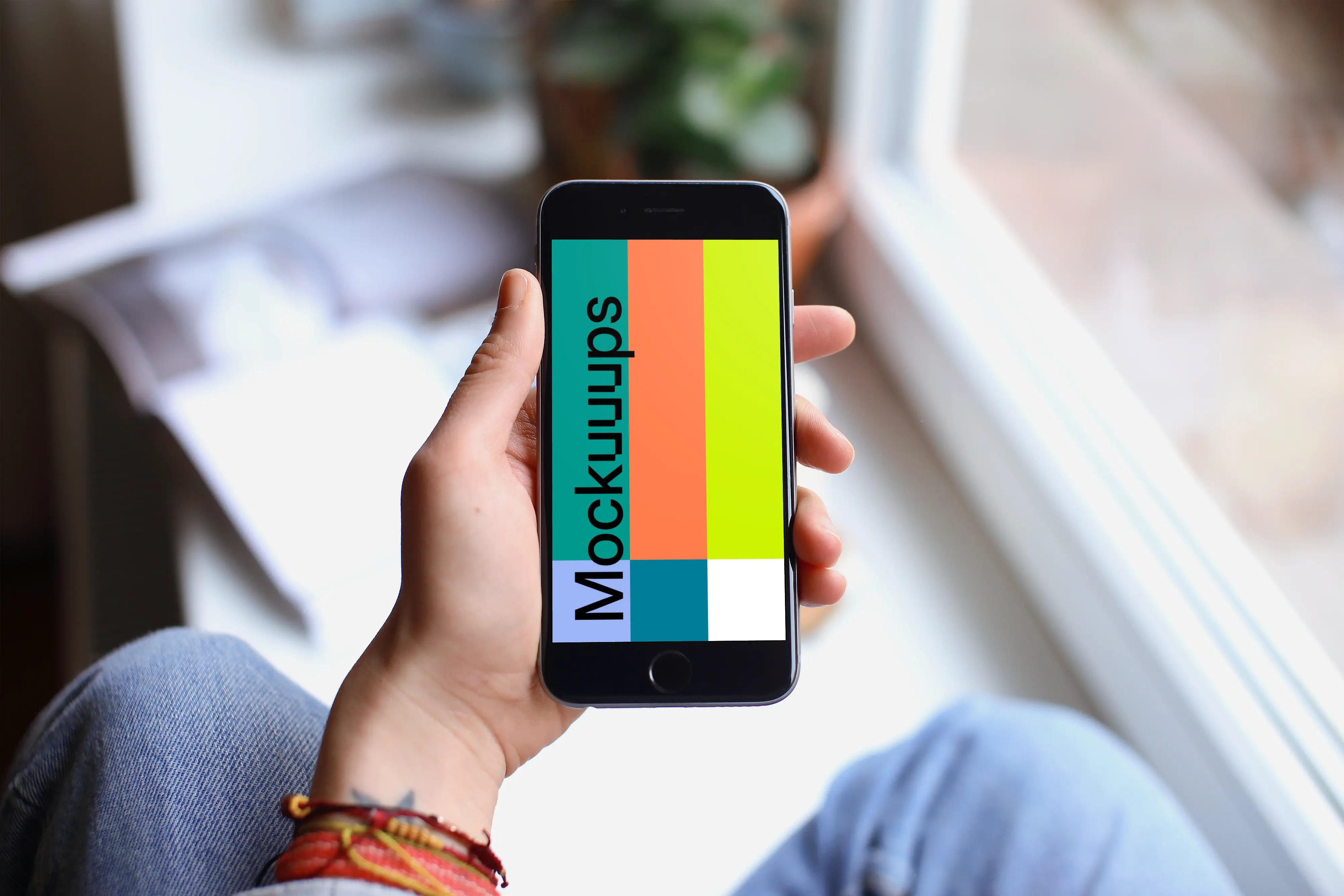 Sitting next to the window with iPhone 6s mockup