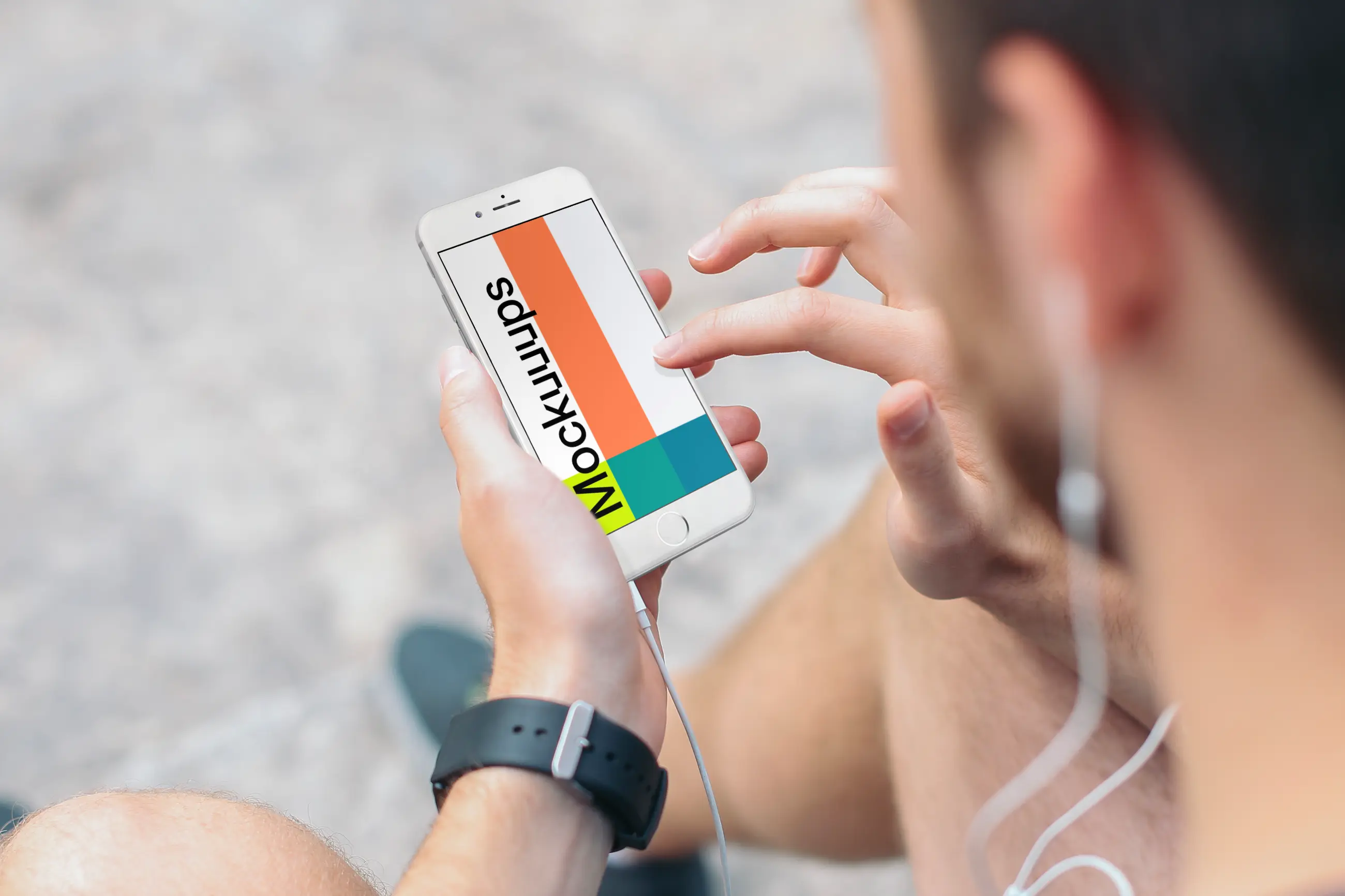 Sitting on Stairs with iPhone 6s mockup and Headphones