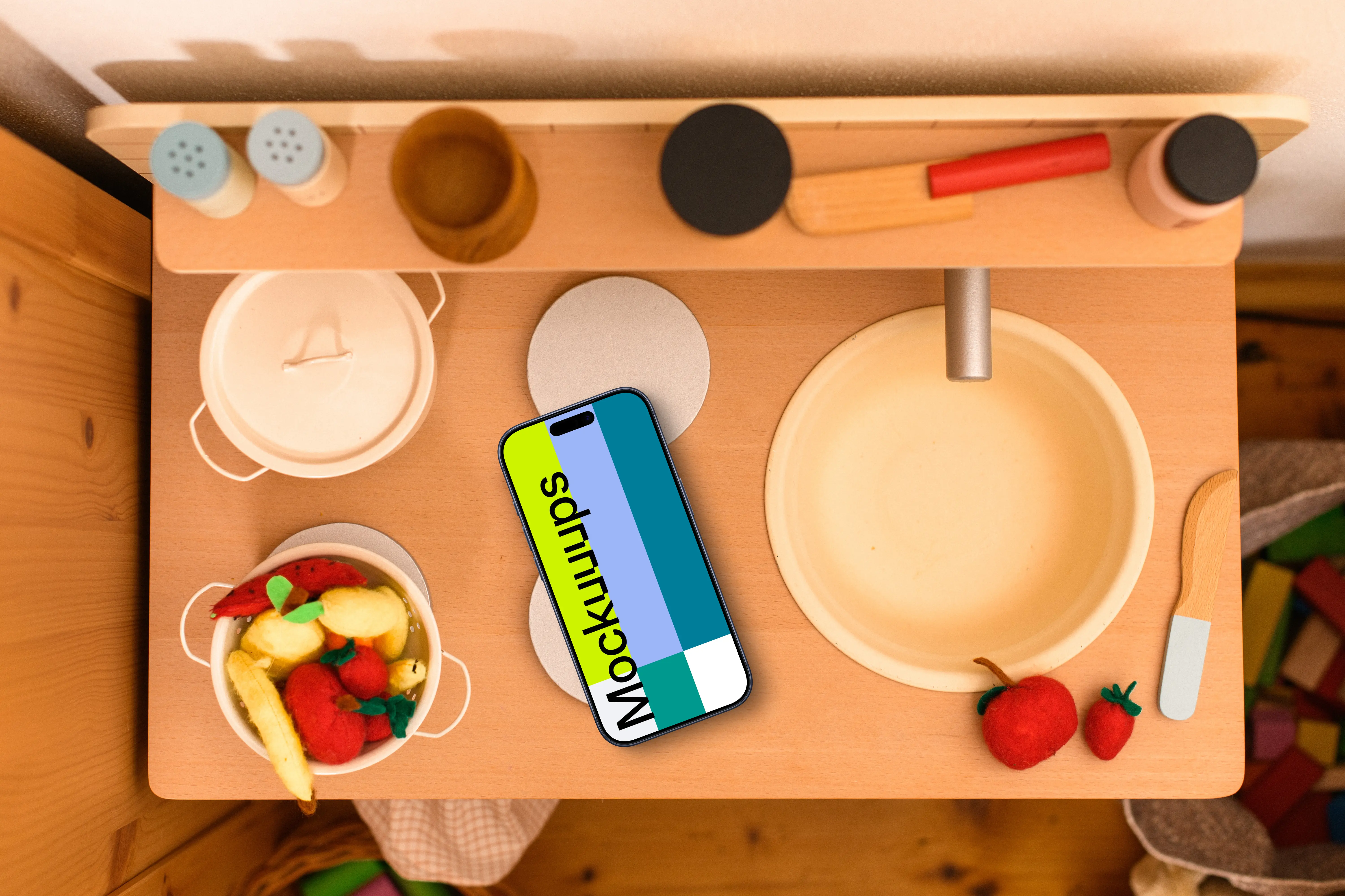 Smartphone mockup on a colorful play kitchen