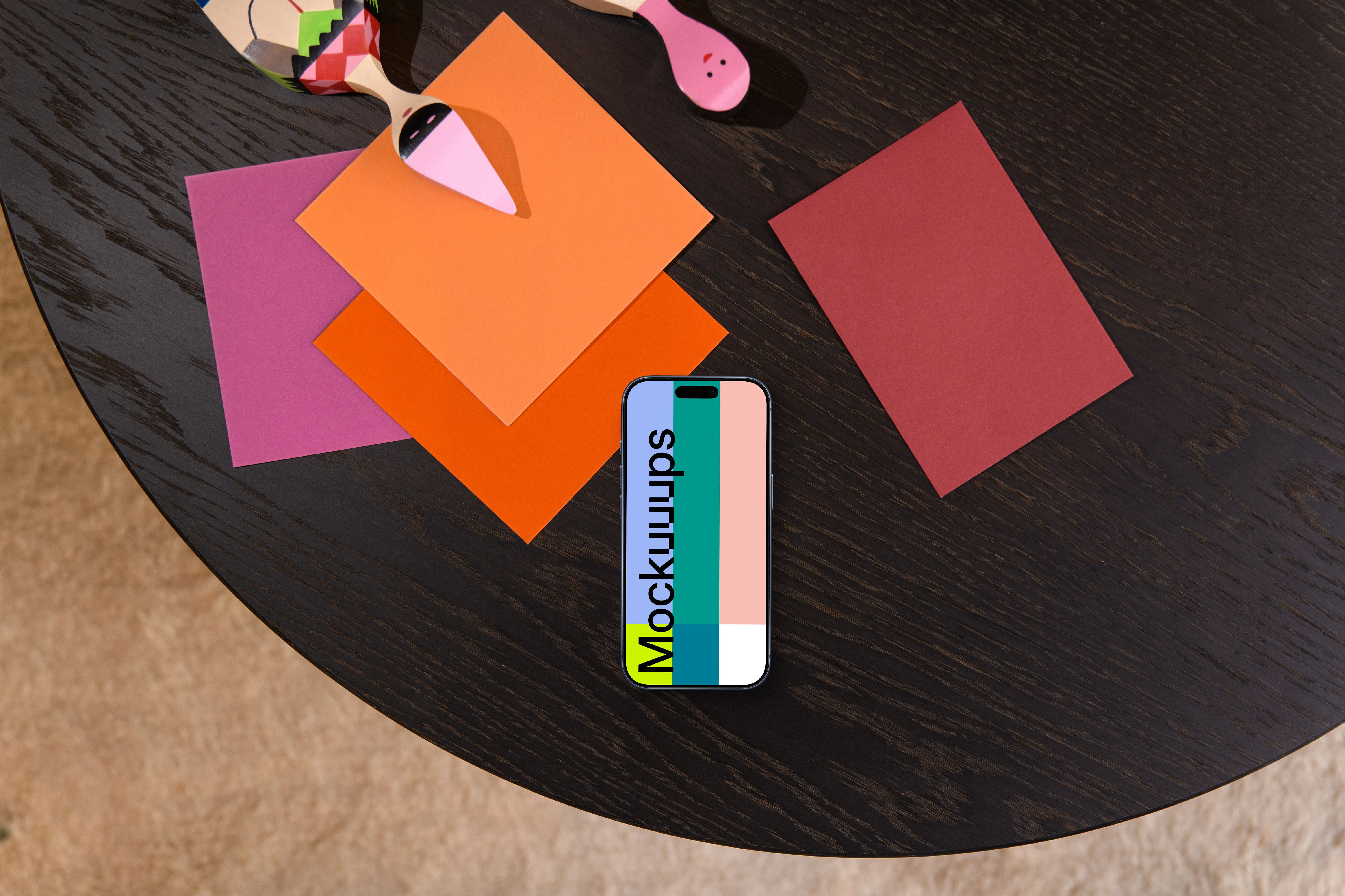 Smartphone mockup on a designer office table