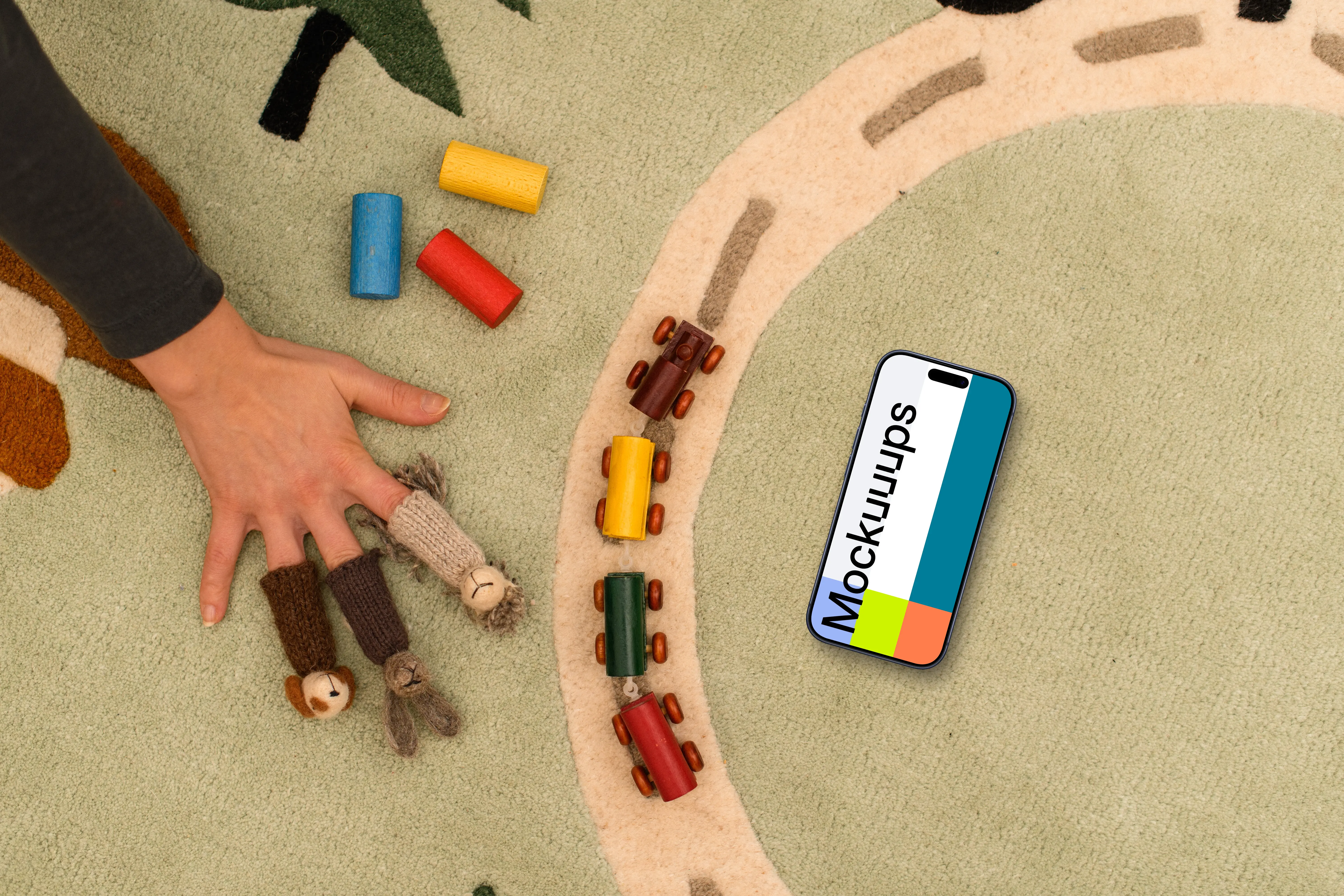 Smartphone mockup on a kid's playmat with toys