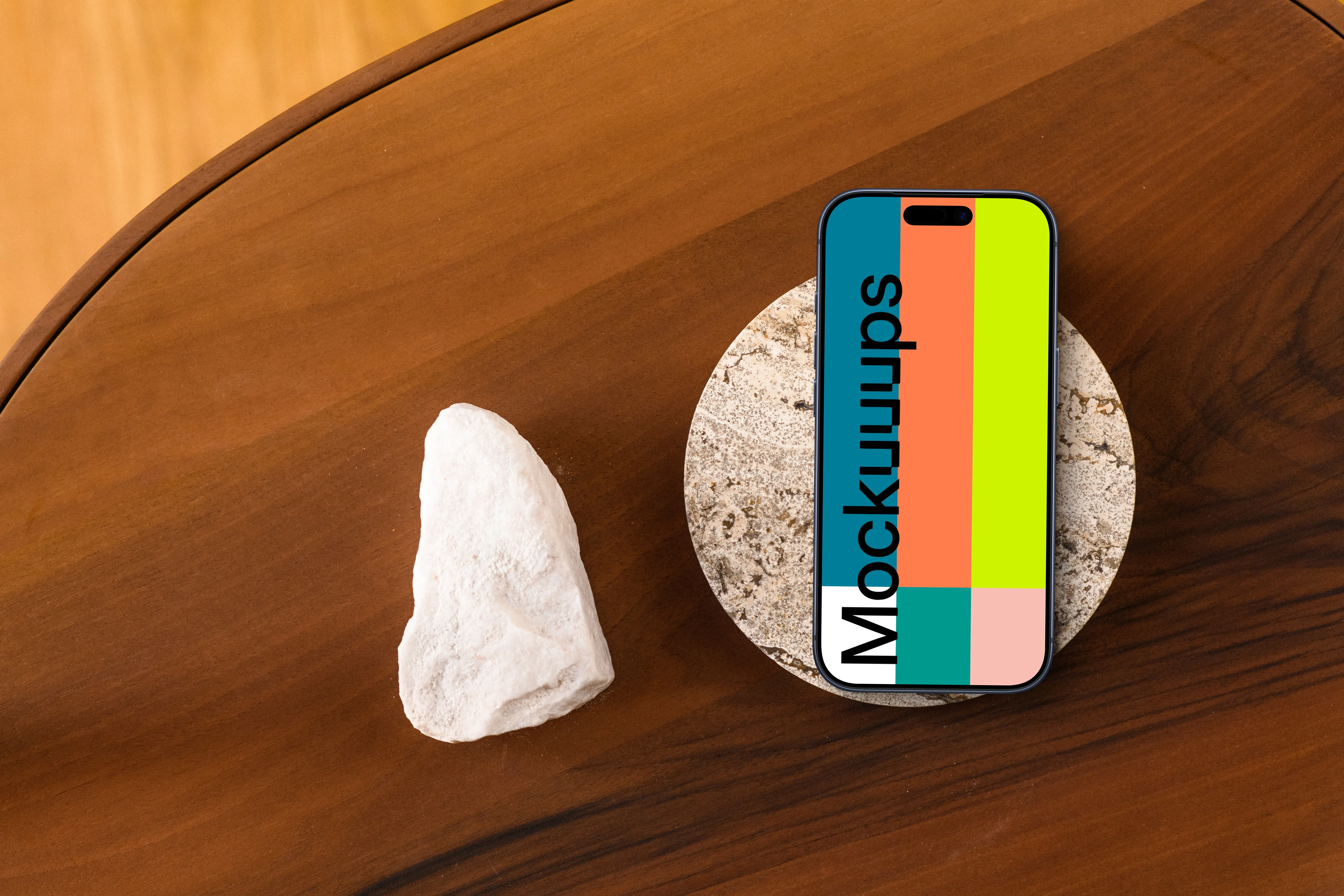 Smartphone mockup on wooden table with stone coaster
