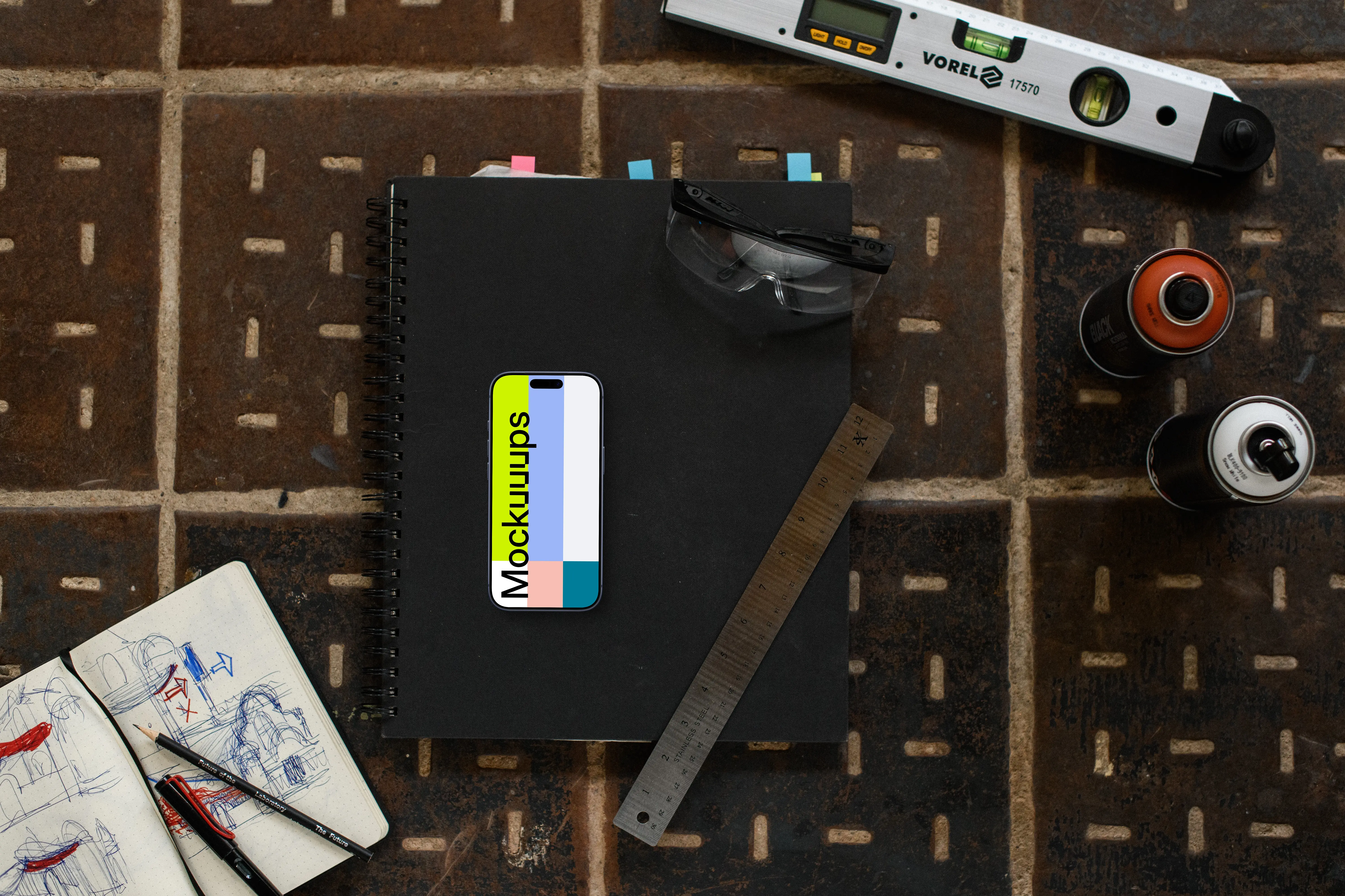 Smartphone mockup with architect tools and sketches