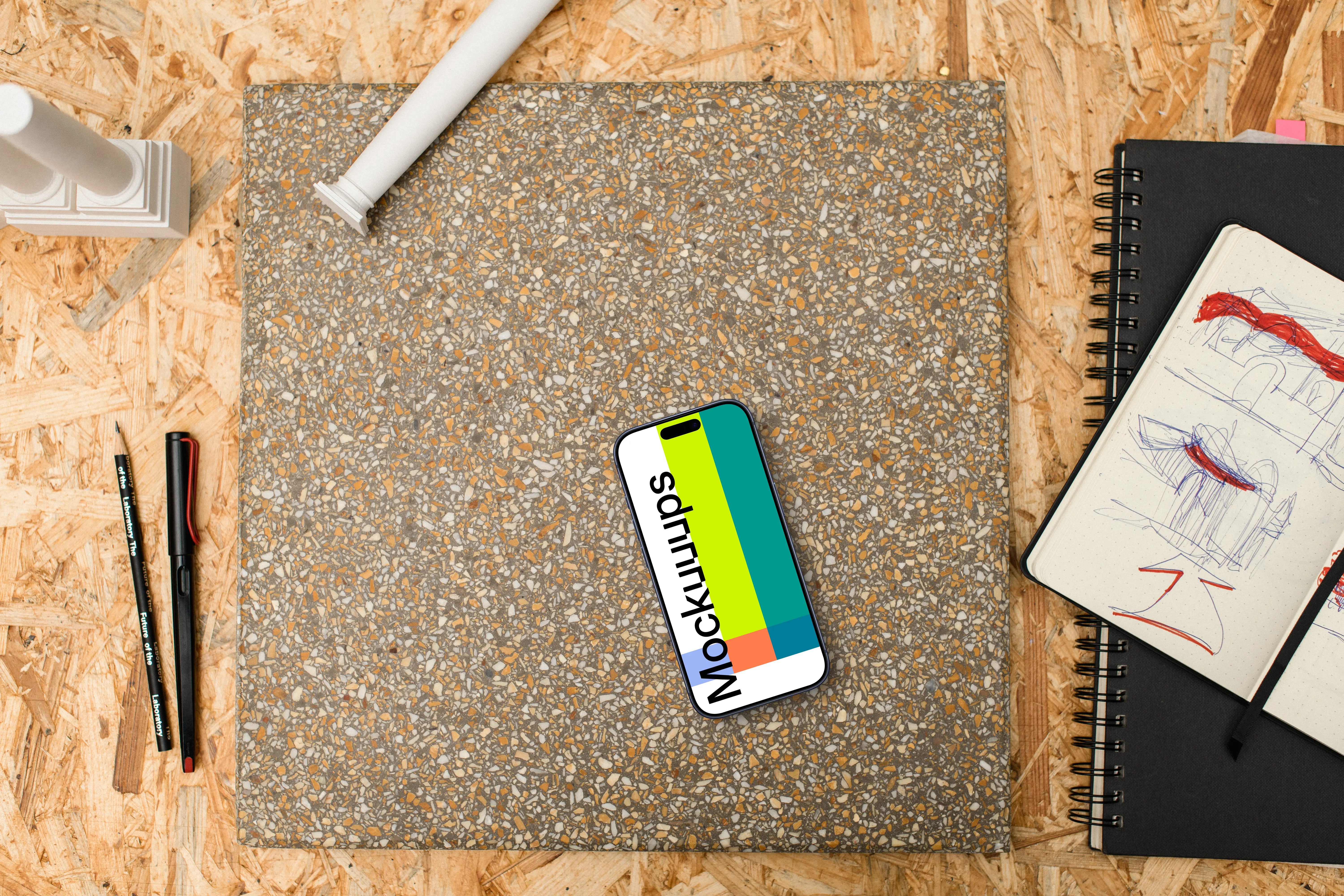 Smartphone mockup with architectural sketching supplies