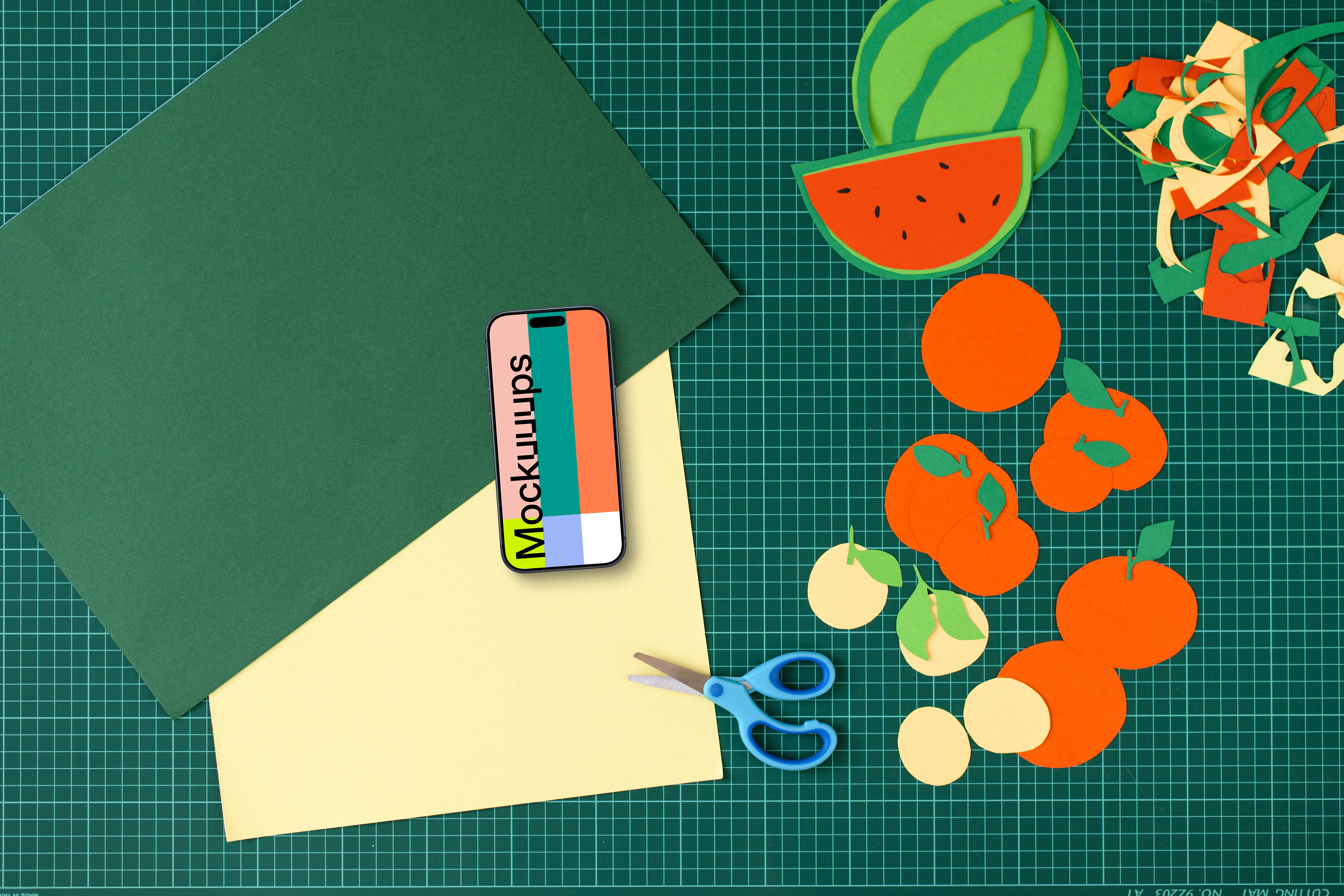 Smartphone mockup with colorful craft materials