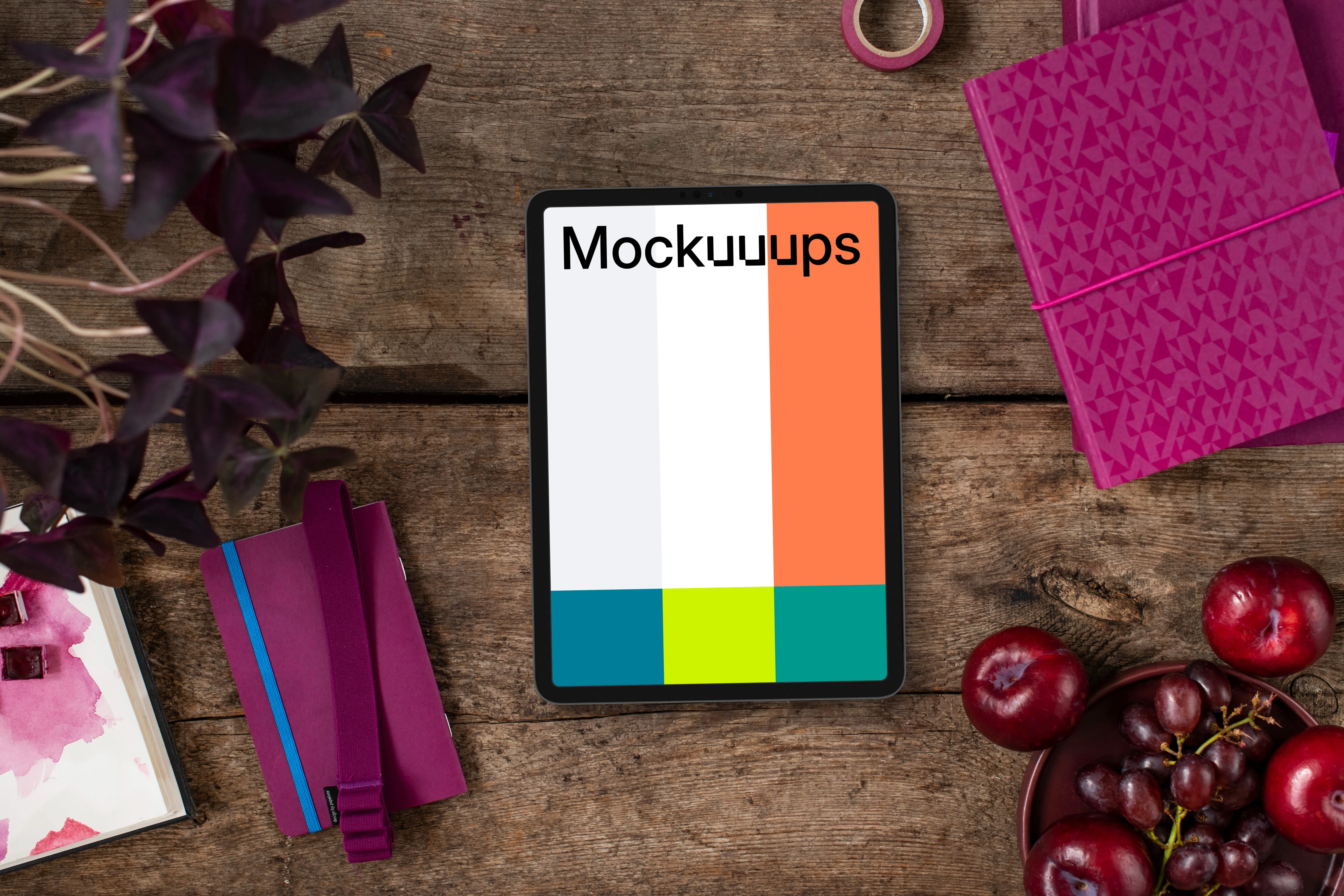 Tablet between Viva Magenta books