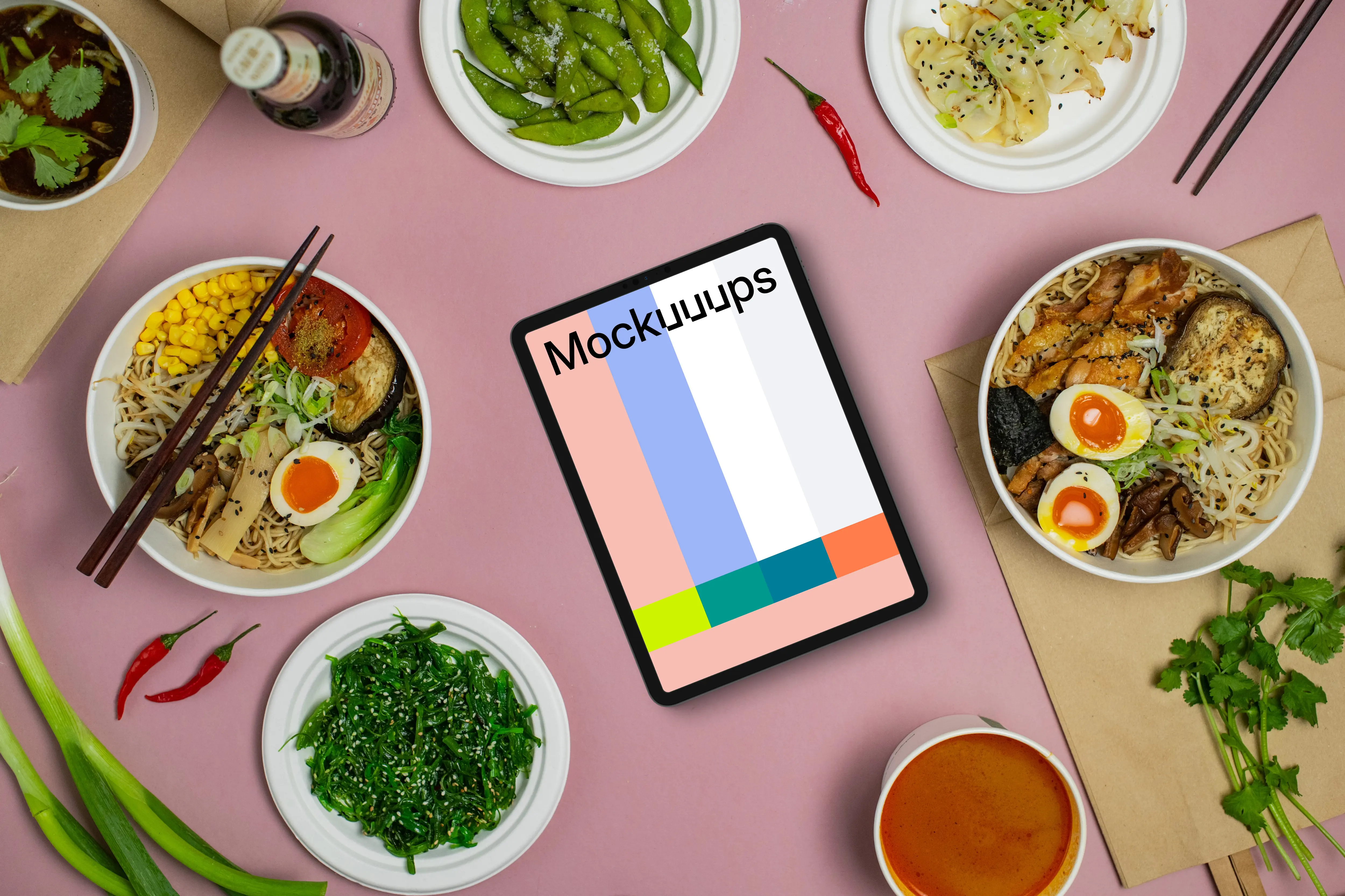 Tablet mockup between Japanese food