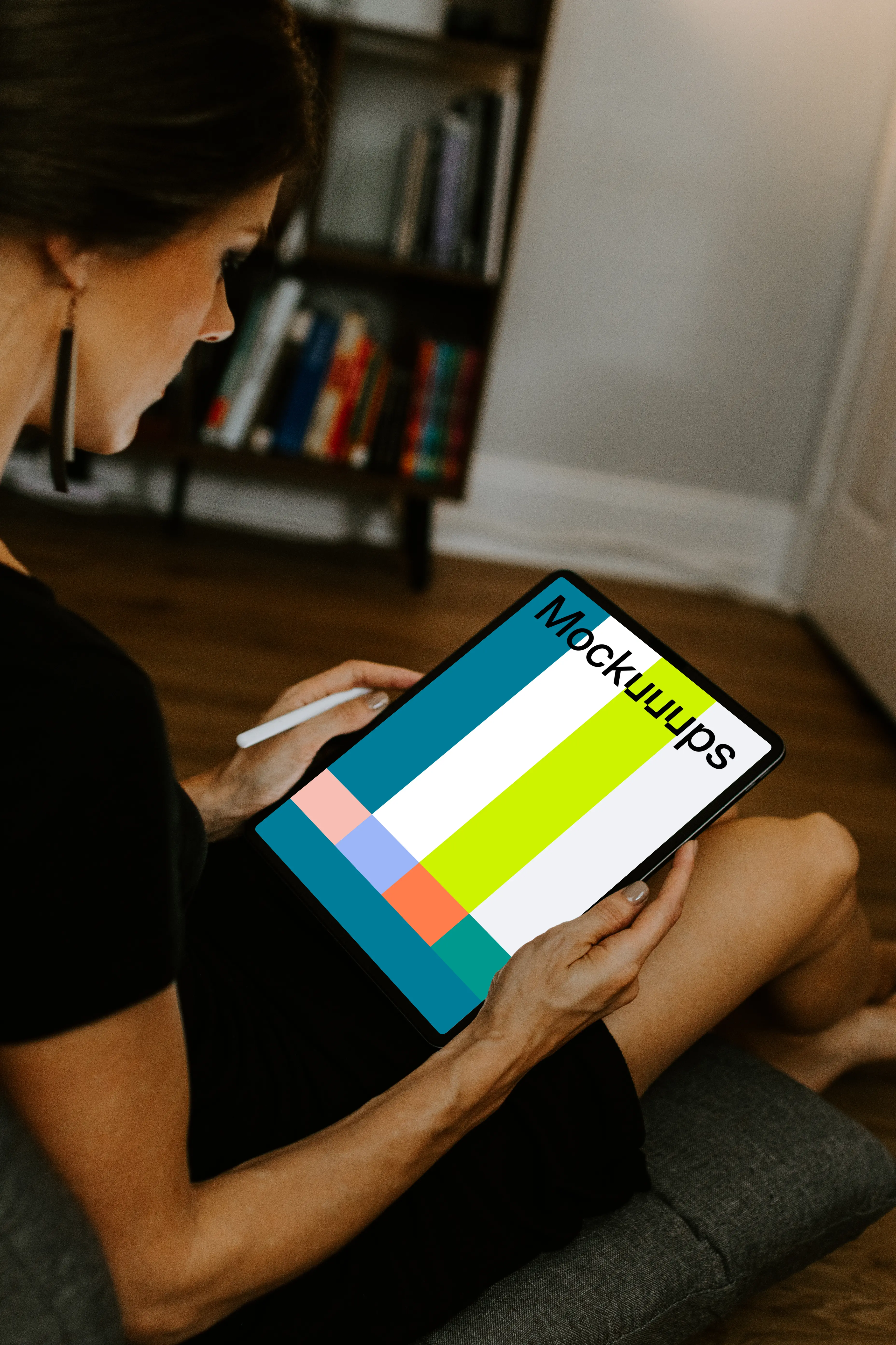 Tablet mockup held with an Apple Pencil