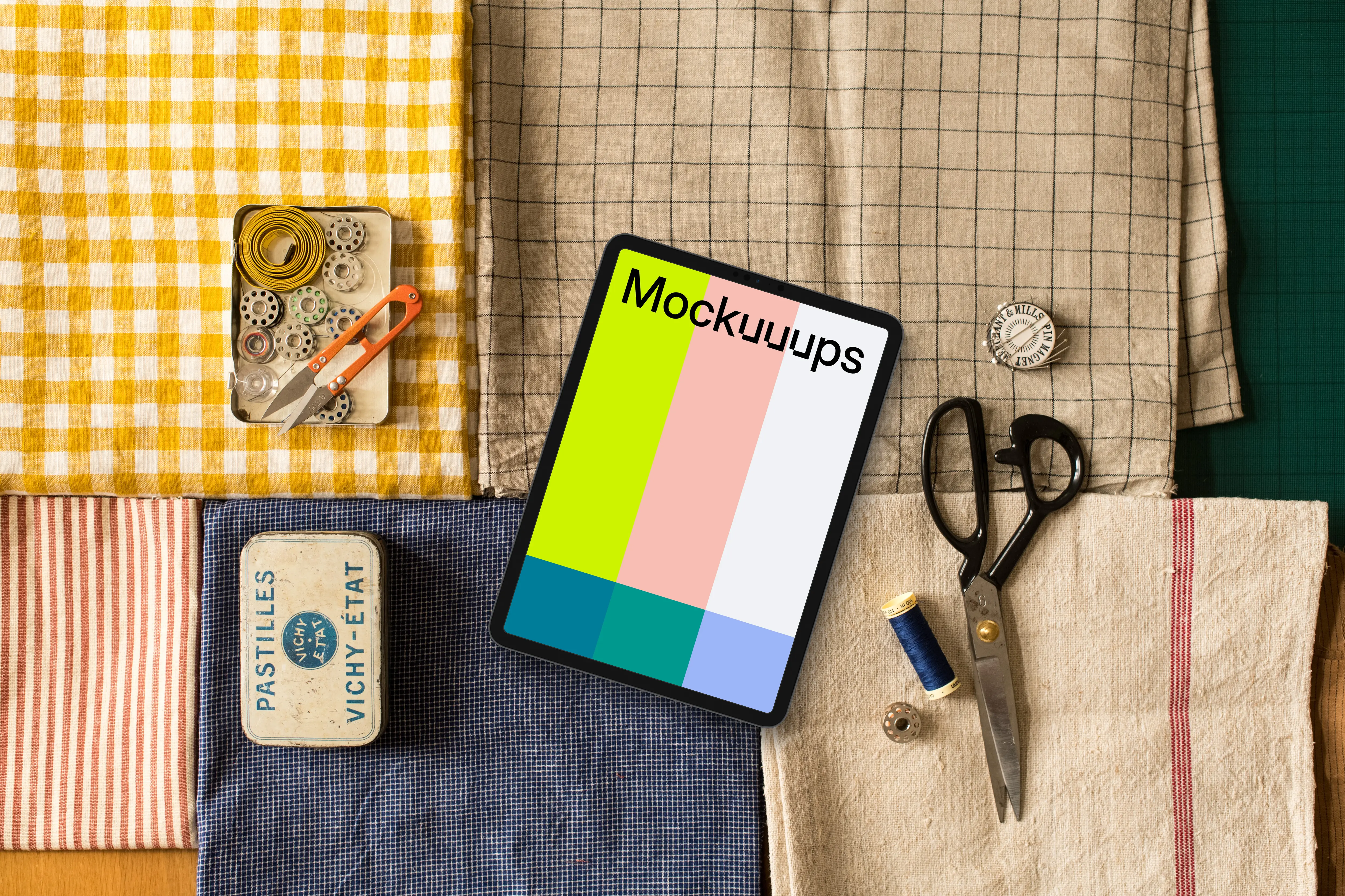 Tablet mockup on folded cloths