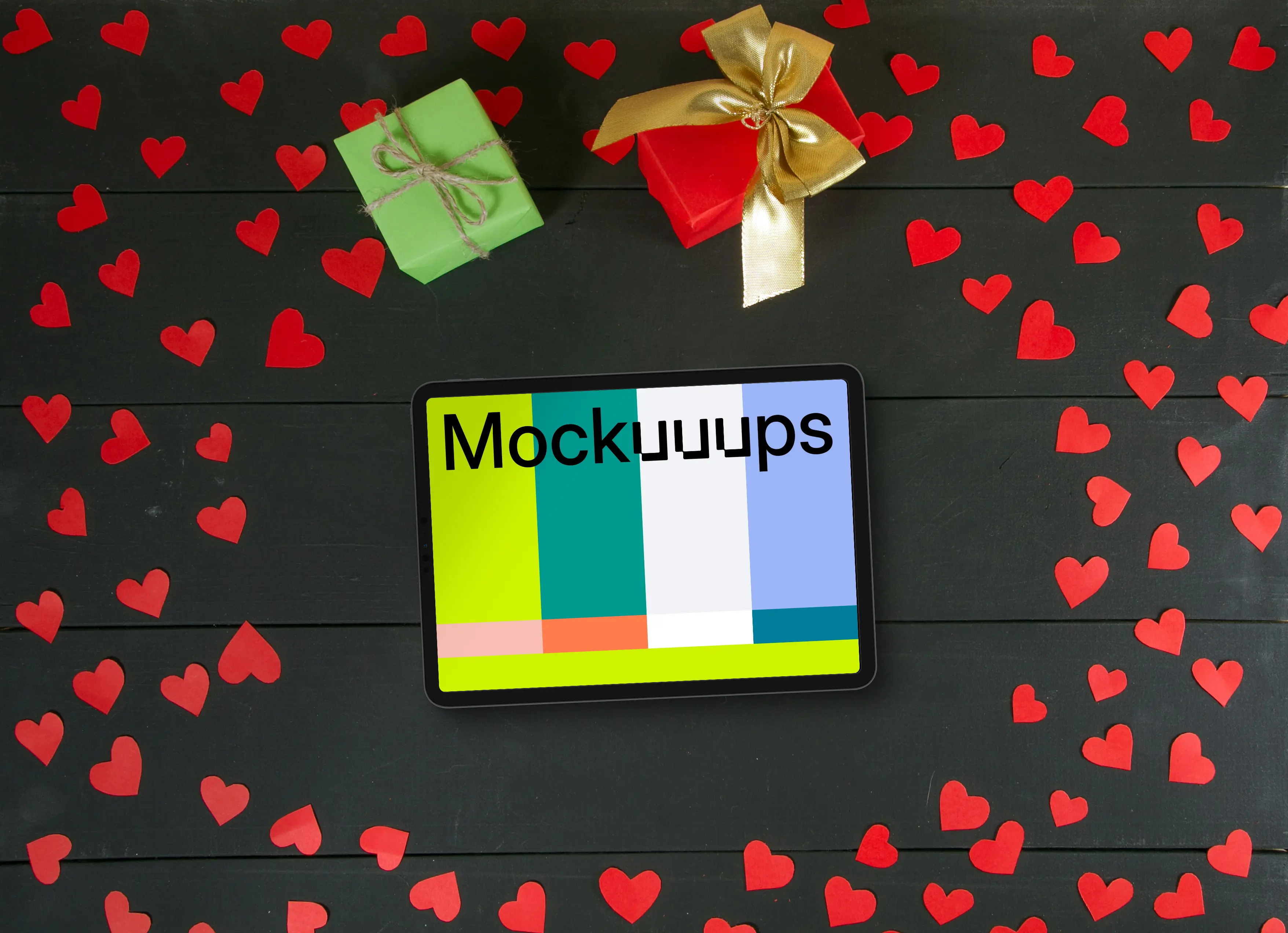 Tablet mockup surrounded by hearts and gifts