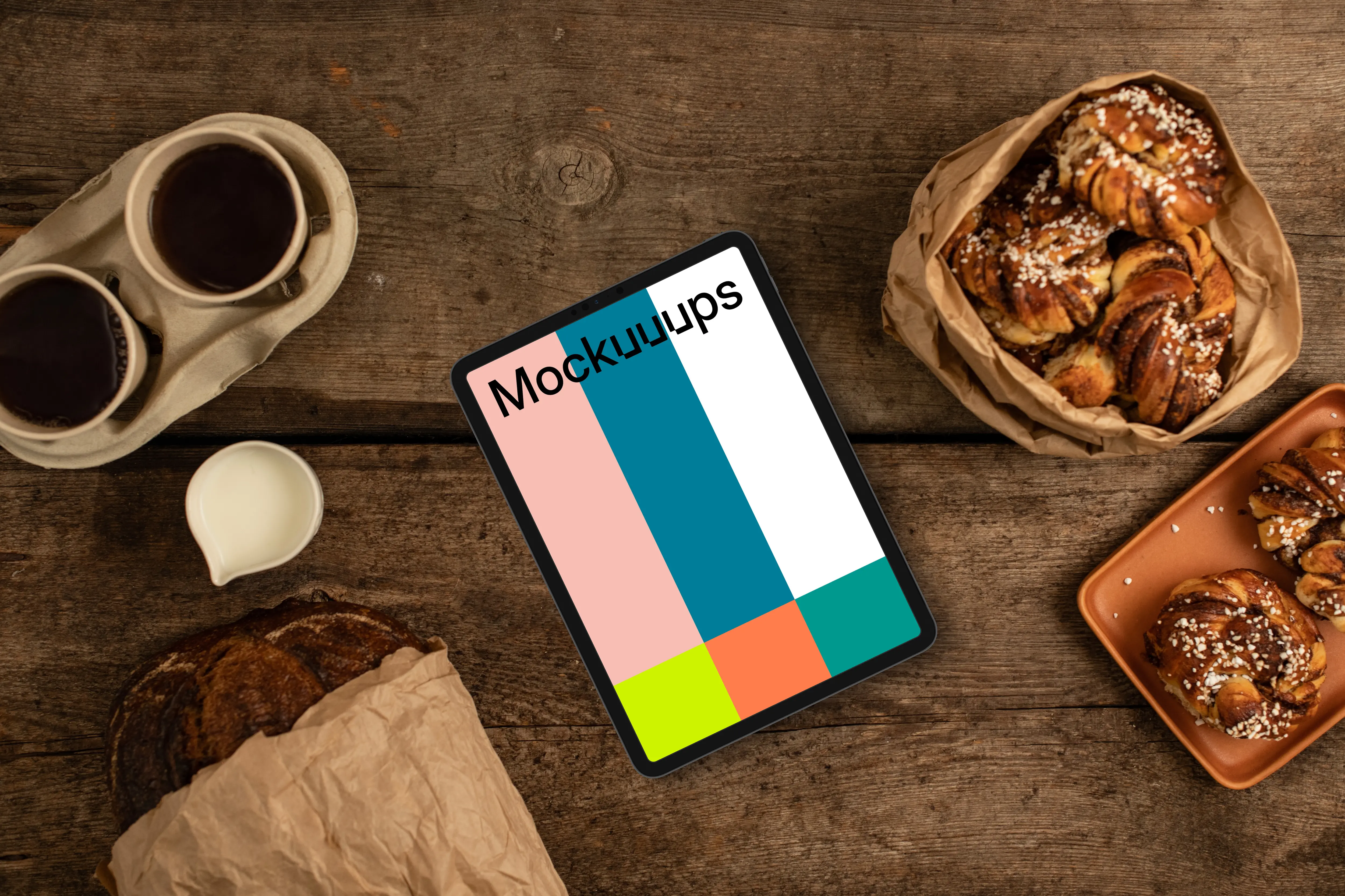 Tablet mockup with pastries and coffee