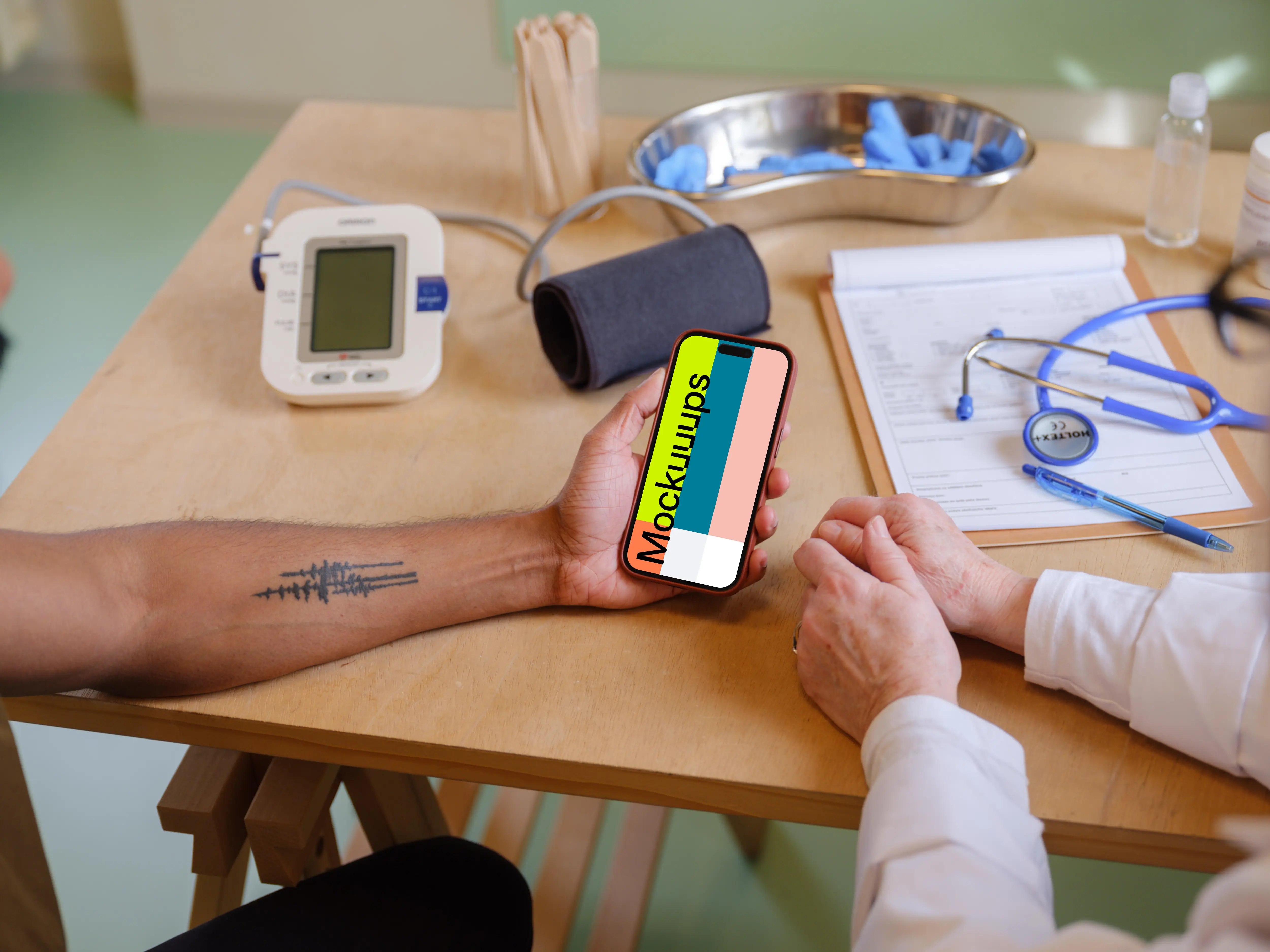 The patient holding a iPhone mockup in doctor’s office