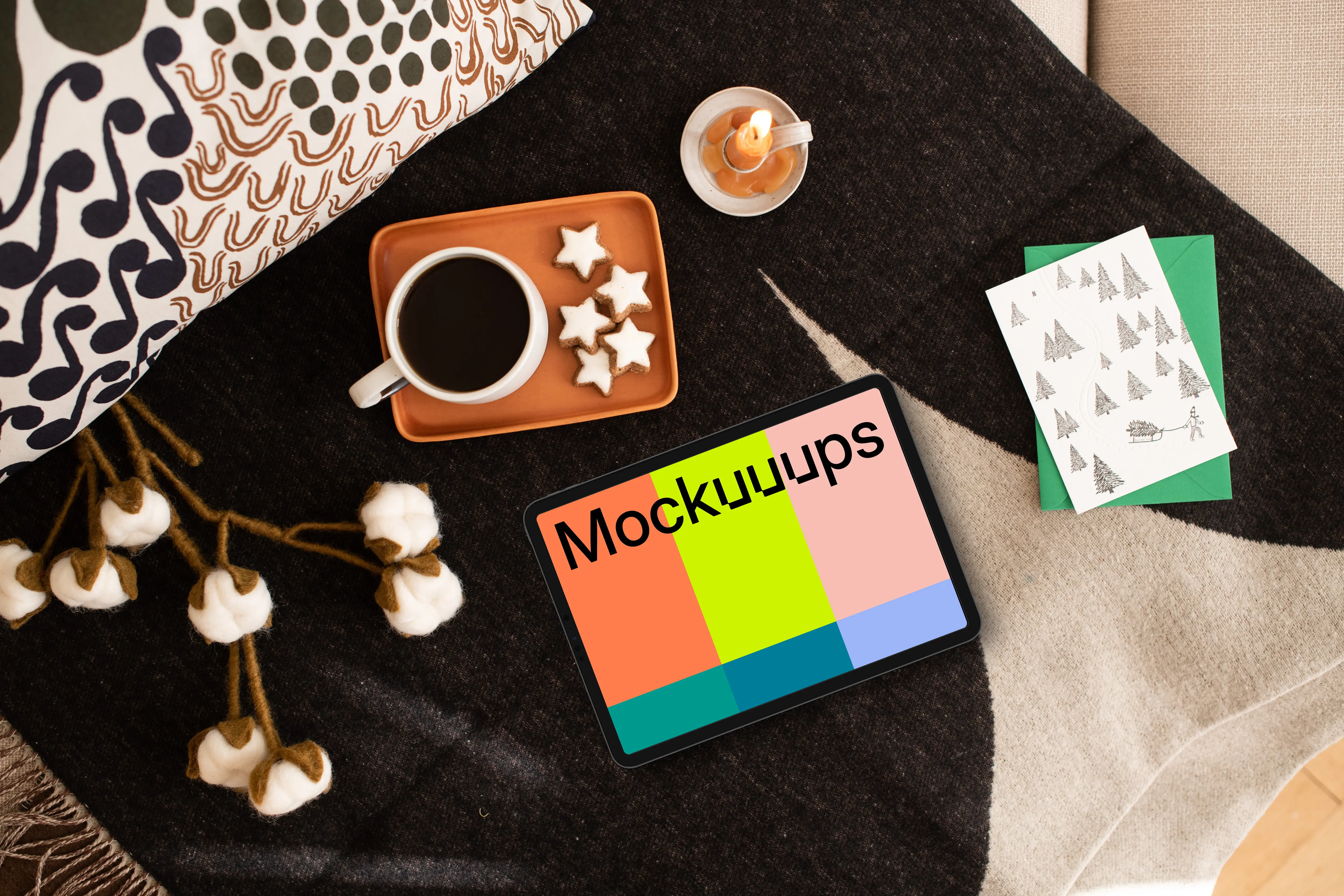 Top view of tablet mockup with Xmas design