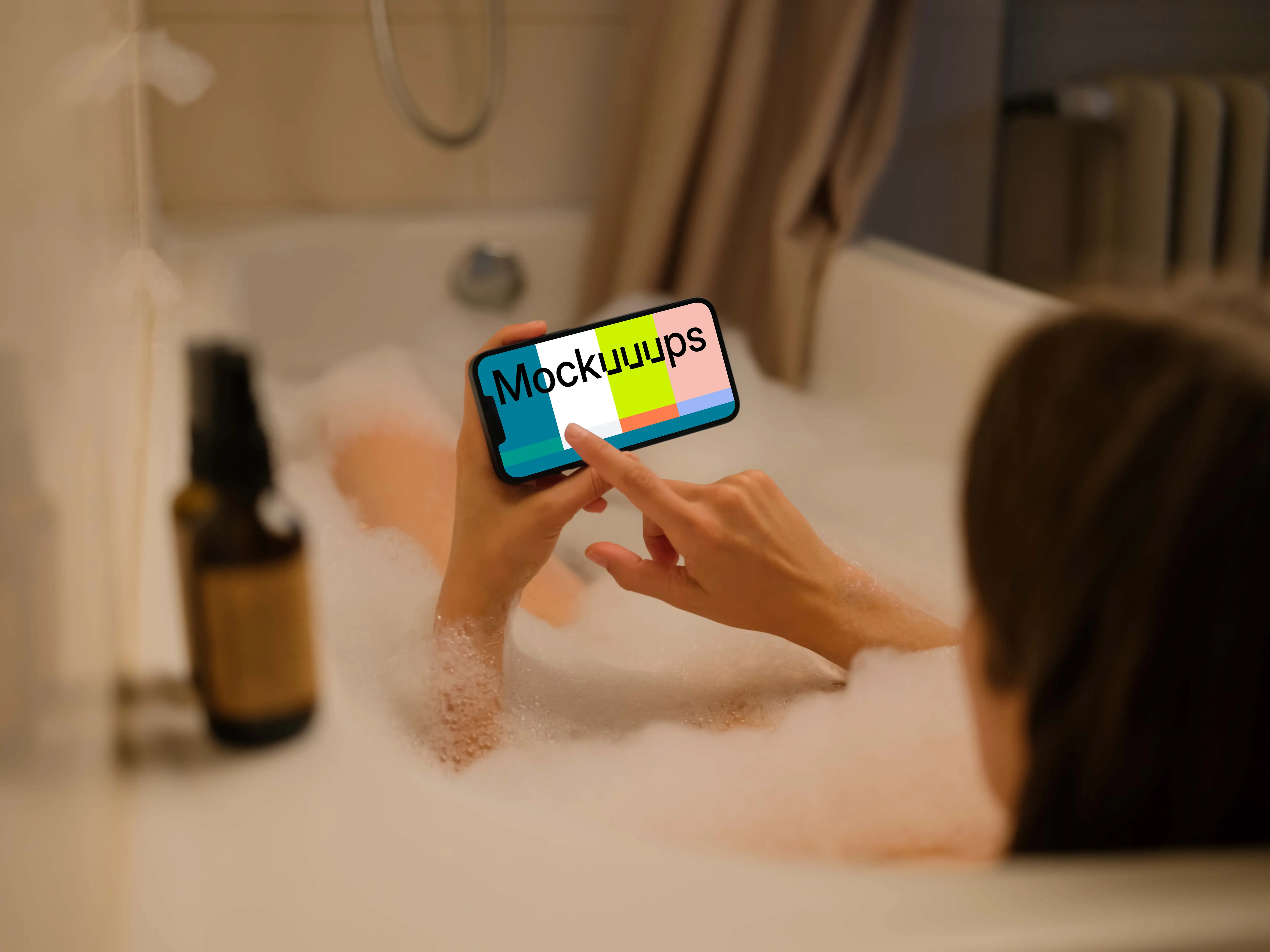 Woman hand typing on an iPhone 13 mockup