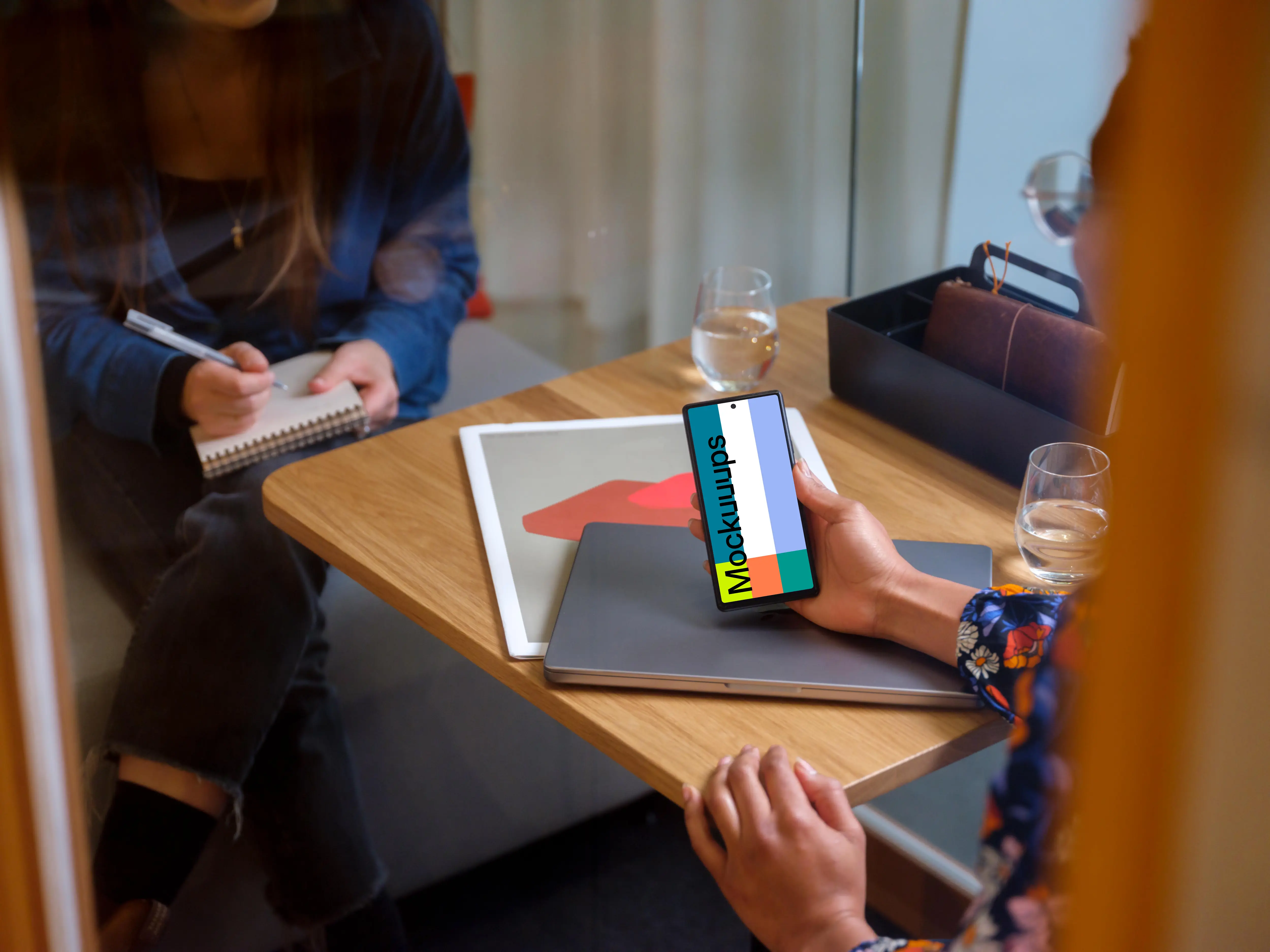 Woman holding a Google Pixel mockup