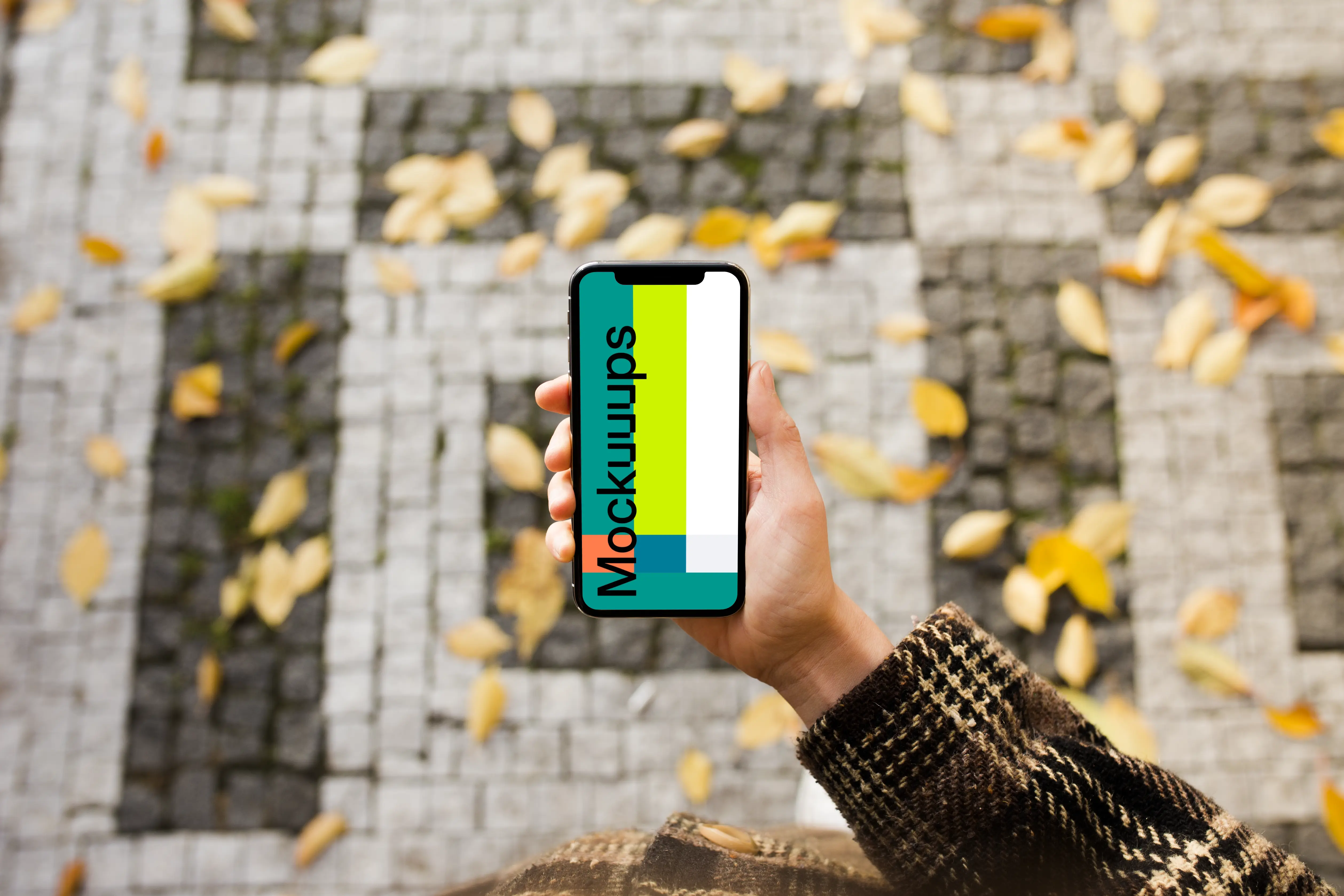 Woman standing with iPhone X mockup