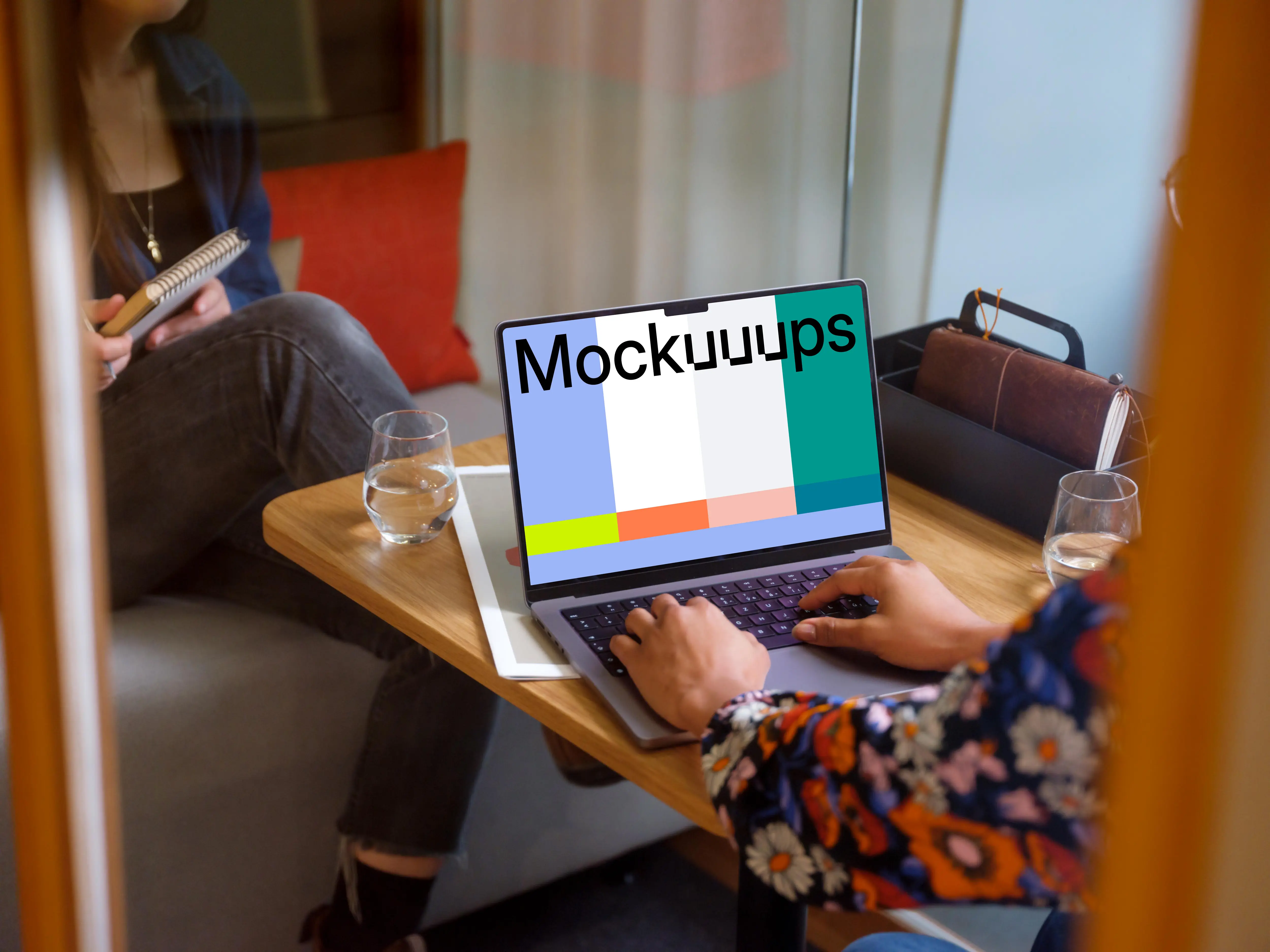 Woman typing on a MacBook Pro 14 mockup