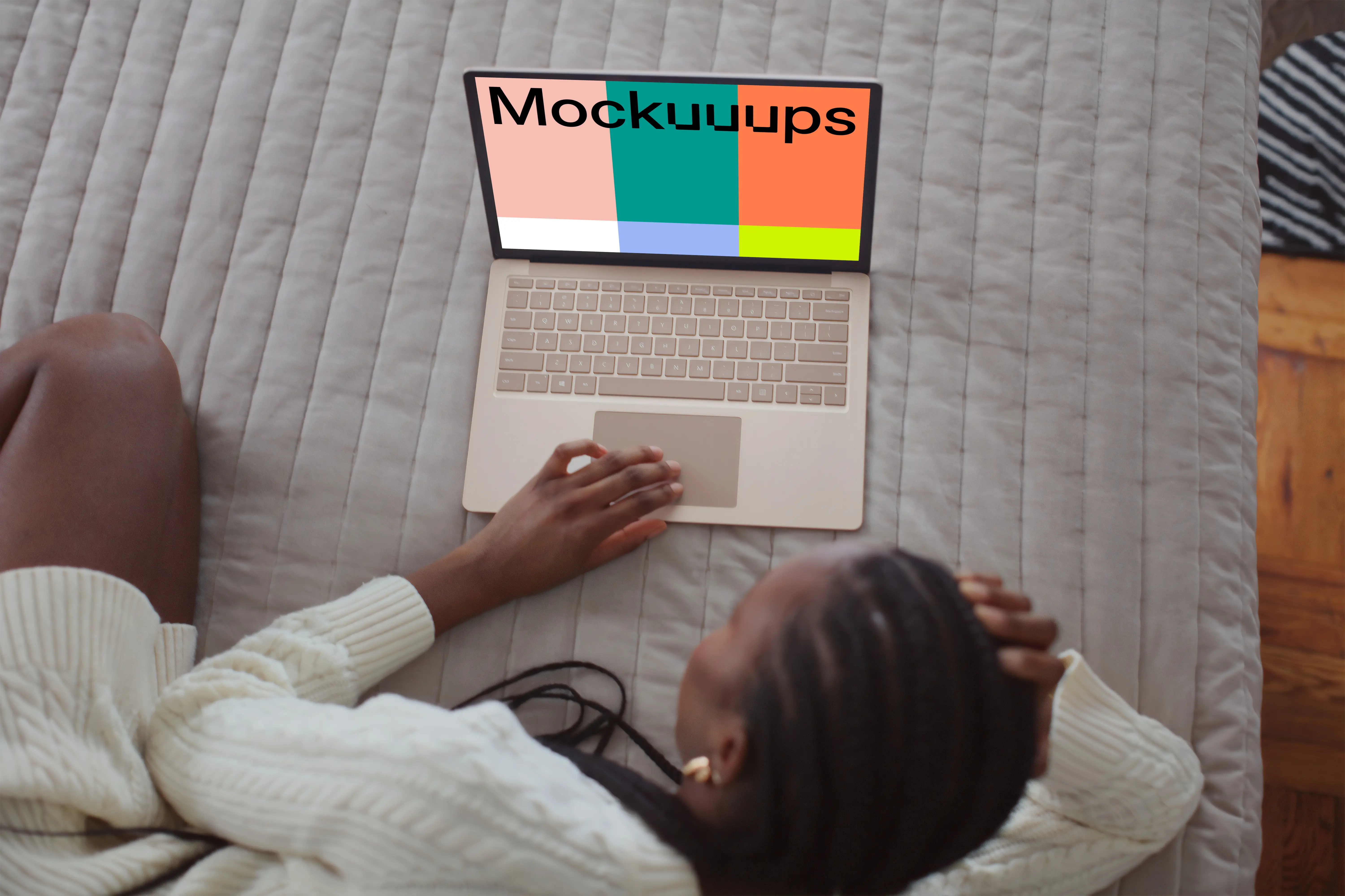 Woman working on the Microsoft Surface Laptop mockup from bed