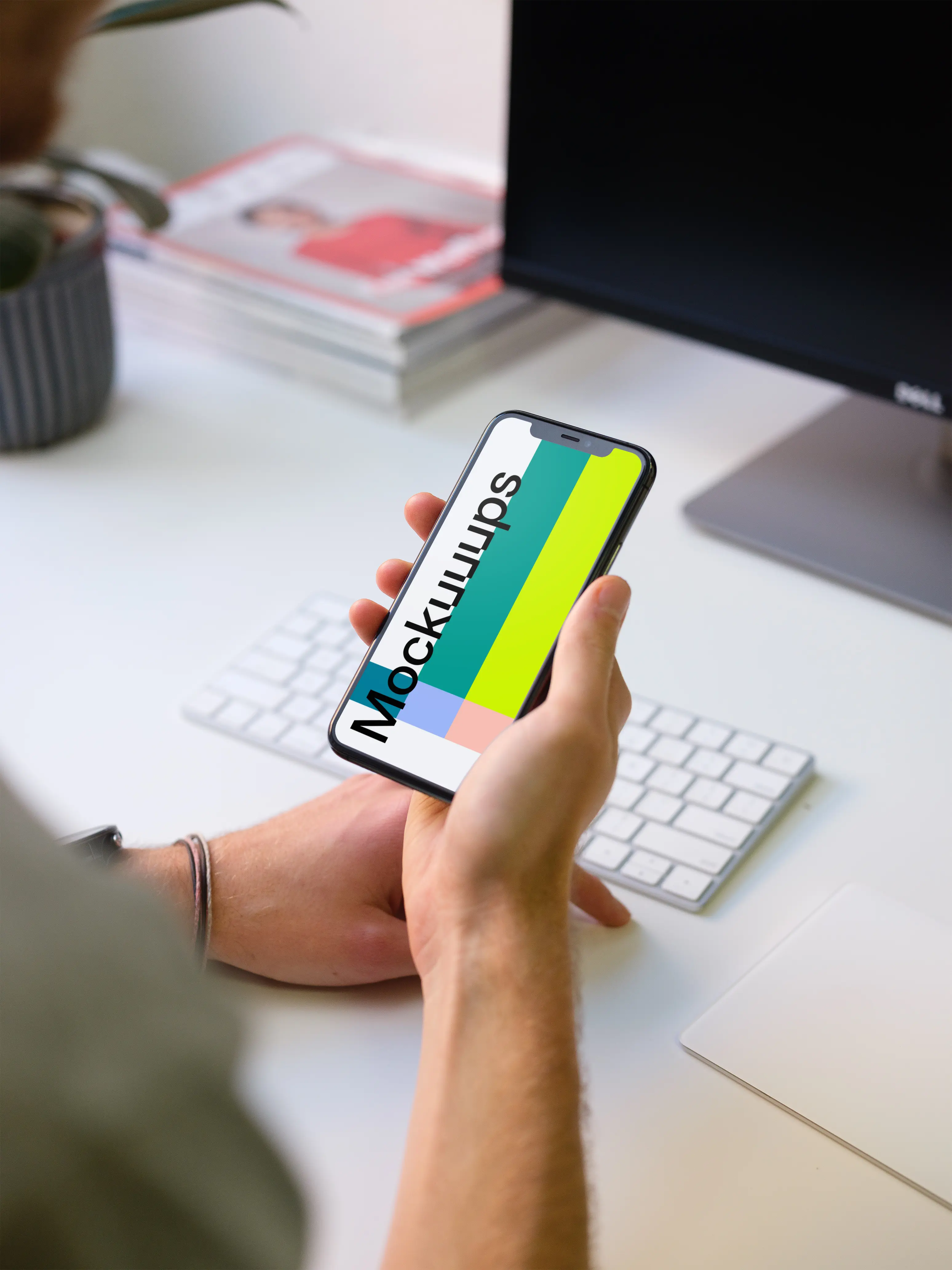 Young man holding iPhone 11 mockup