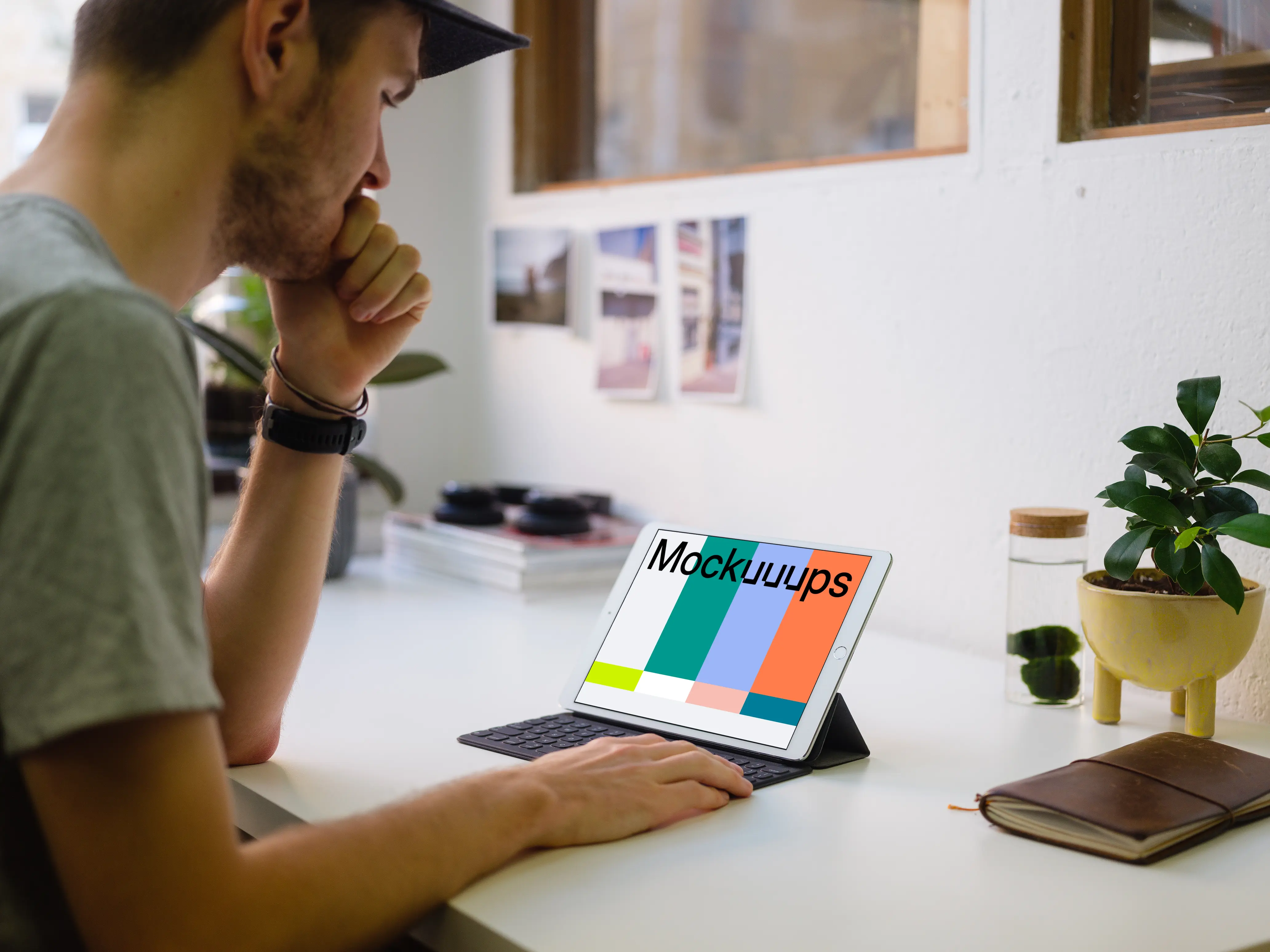 Young man working on the iPad Pro mockup